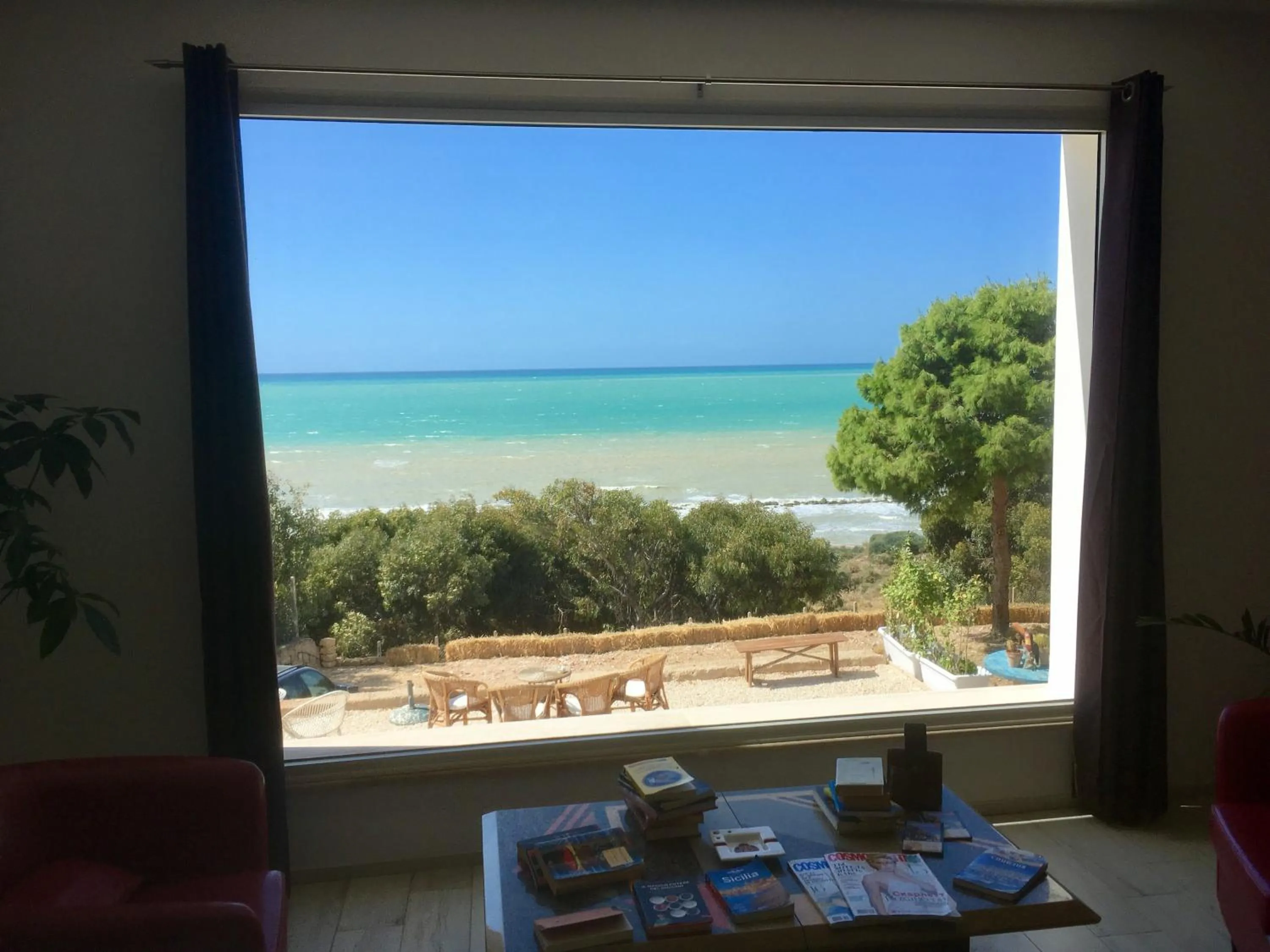 Communal lounge/ TV room in Locazione Turistica Il Tucano