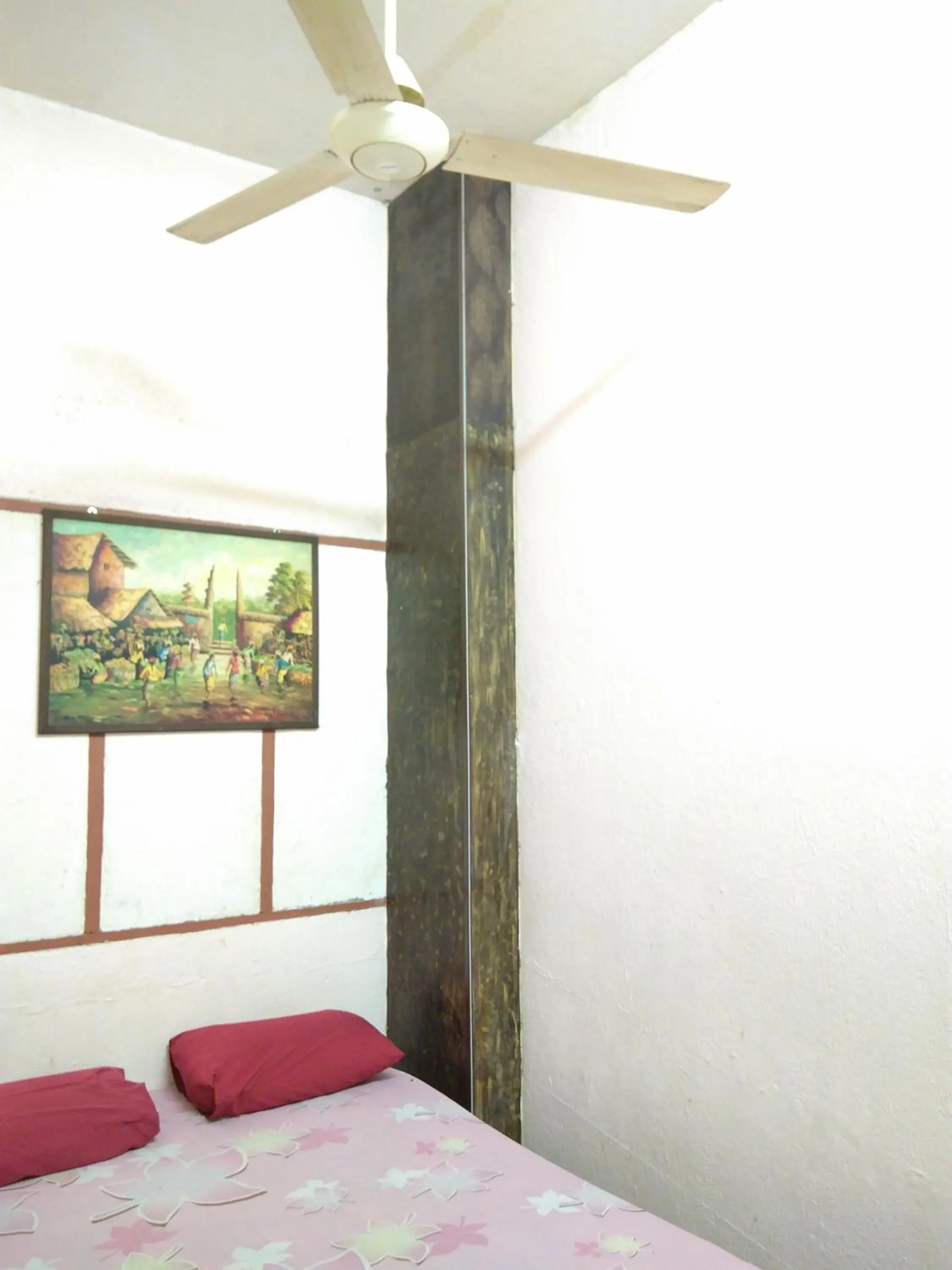 Bed in New Budget Inn Hotel