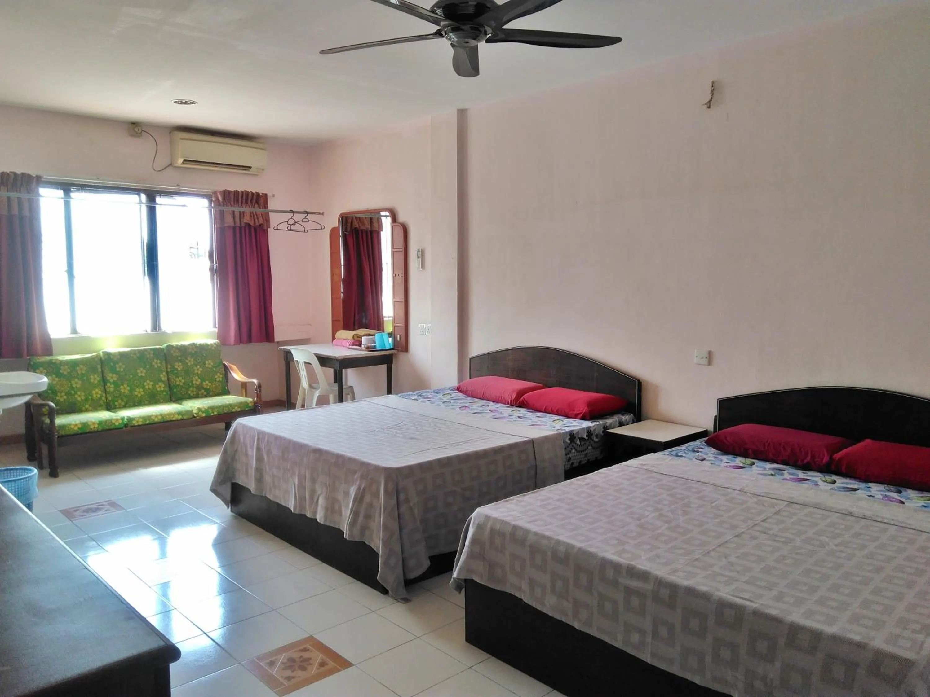 Bed in New Budget Inn Hotel