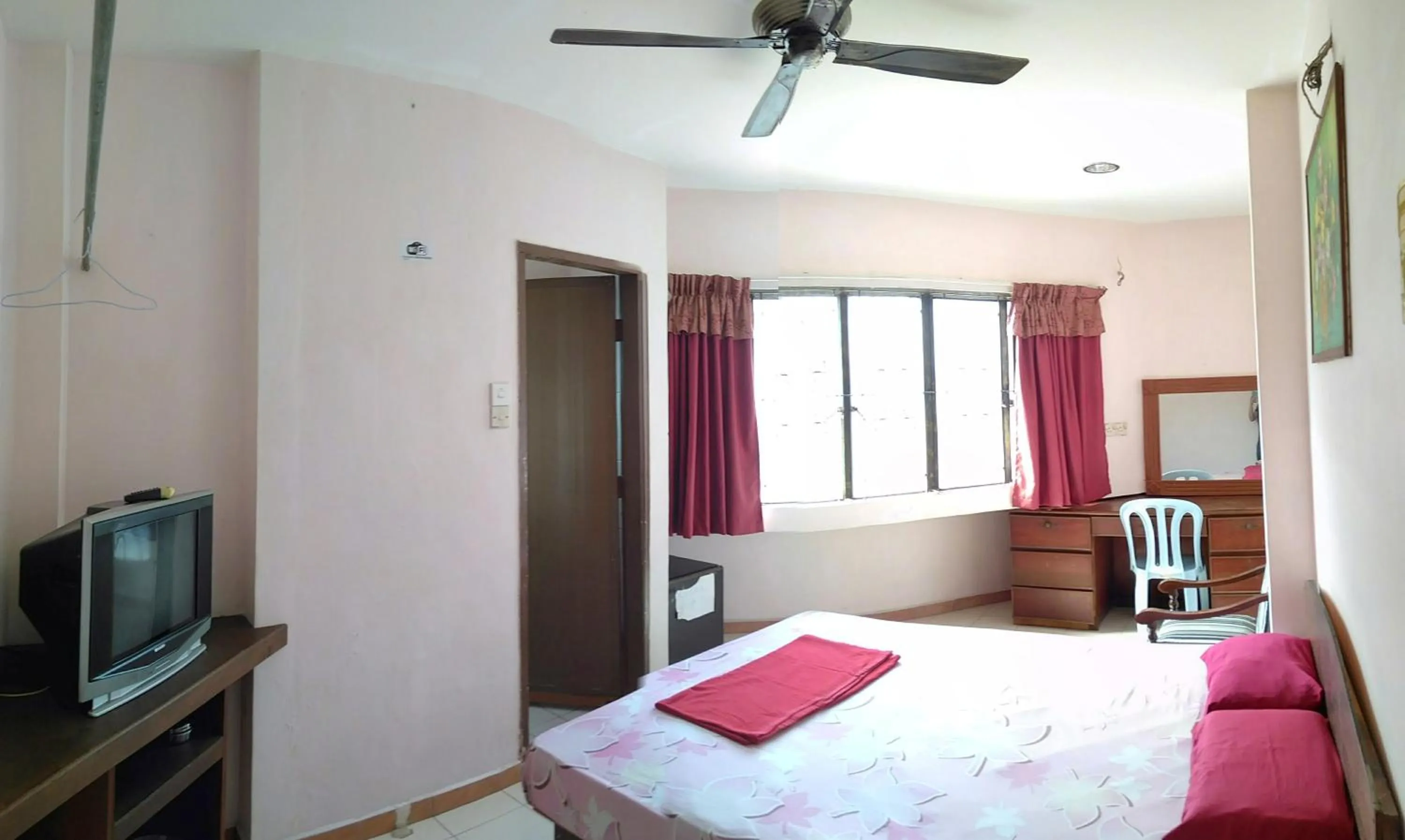 Bed in New Budget Inn Hotel
