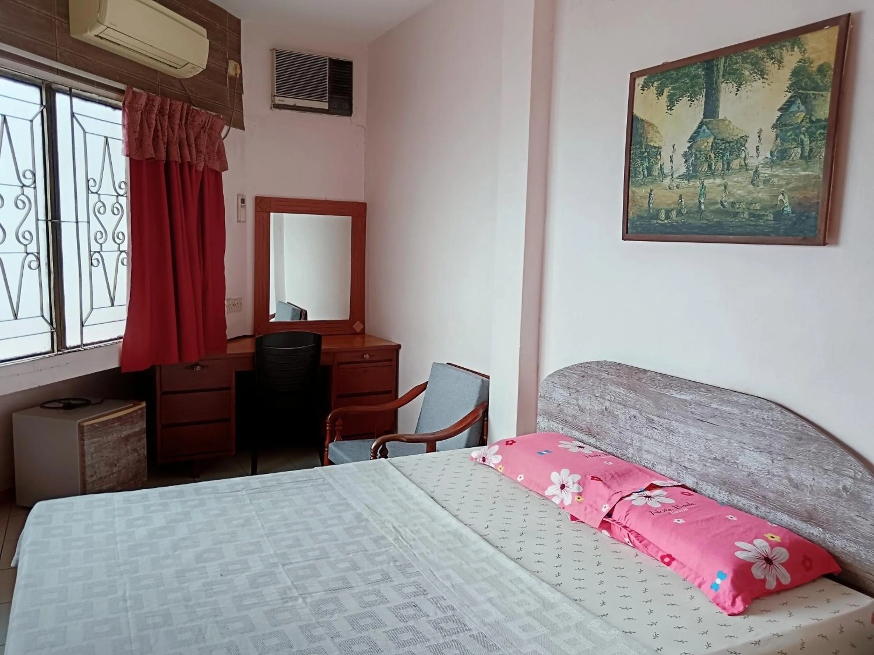 Bed in New Budget Inn Hotel