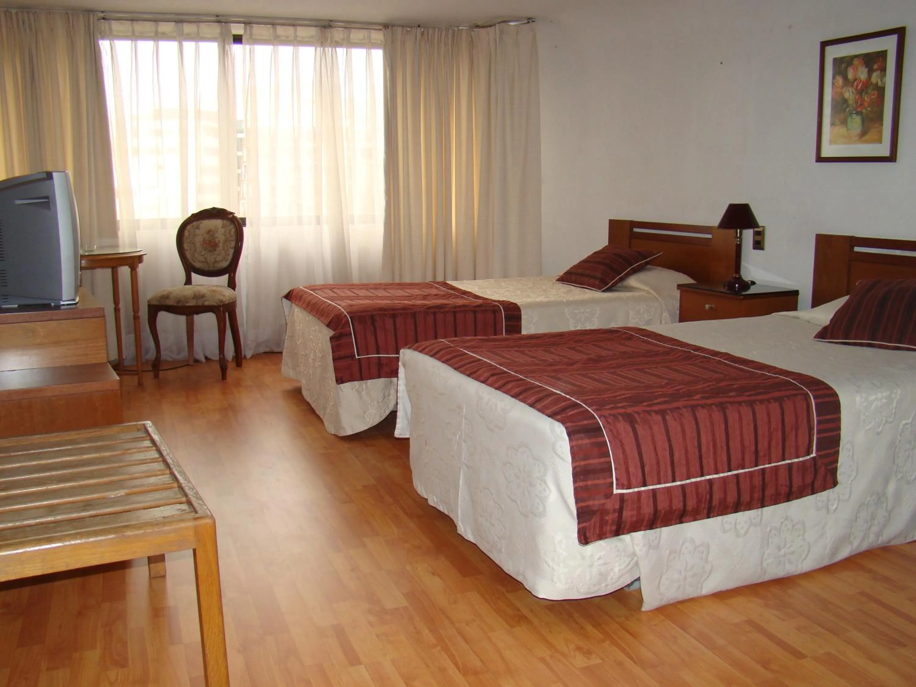Photo of the whole room, Bed in Hotel Montecarlo Viña del Mar