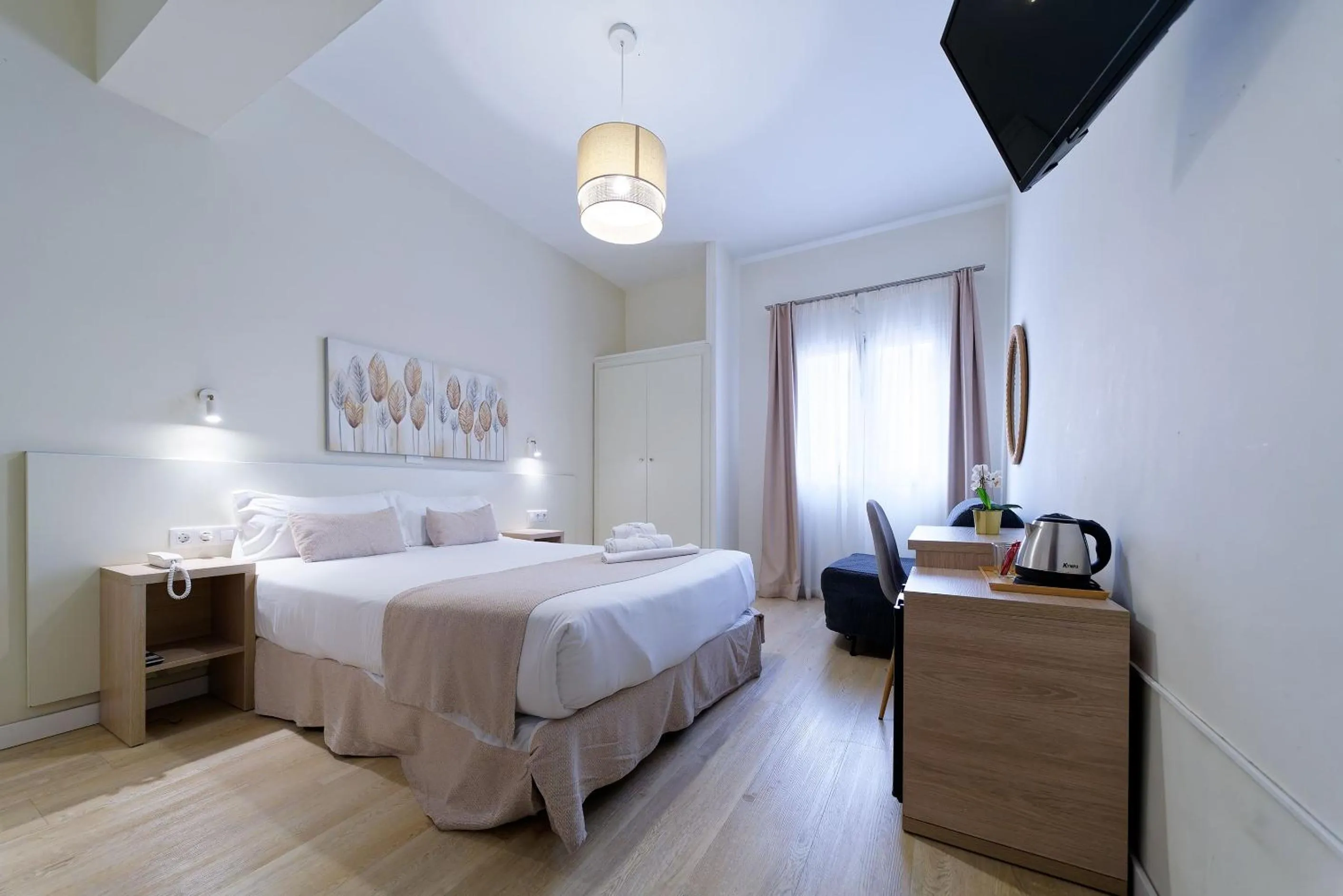 Bed in Ura Hotels Boutique Gurea
