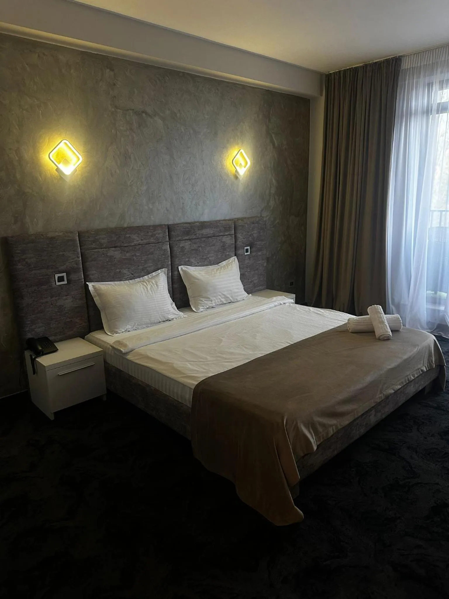 Bed in Black Tulip Hotel