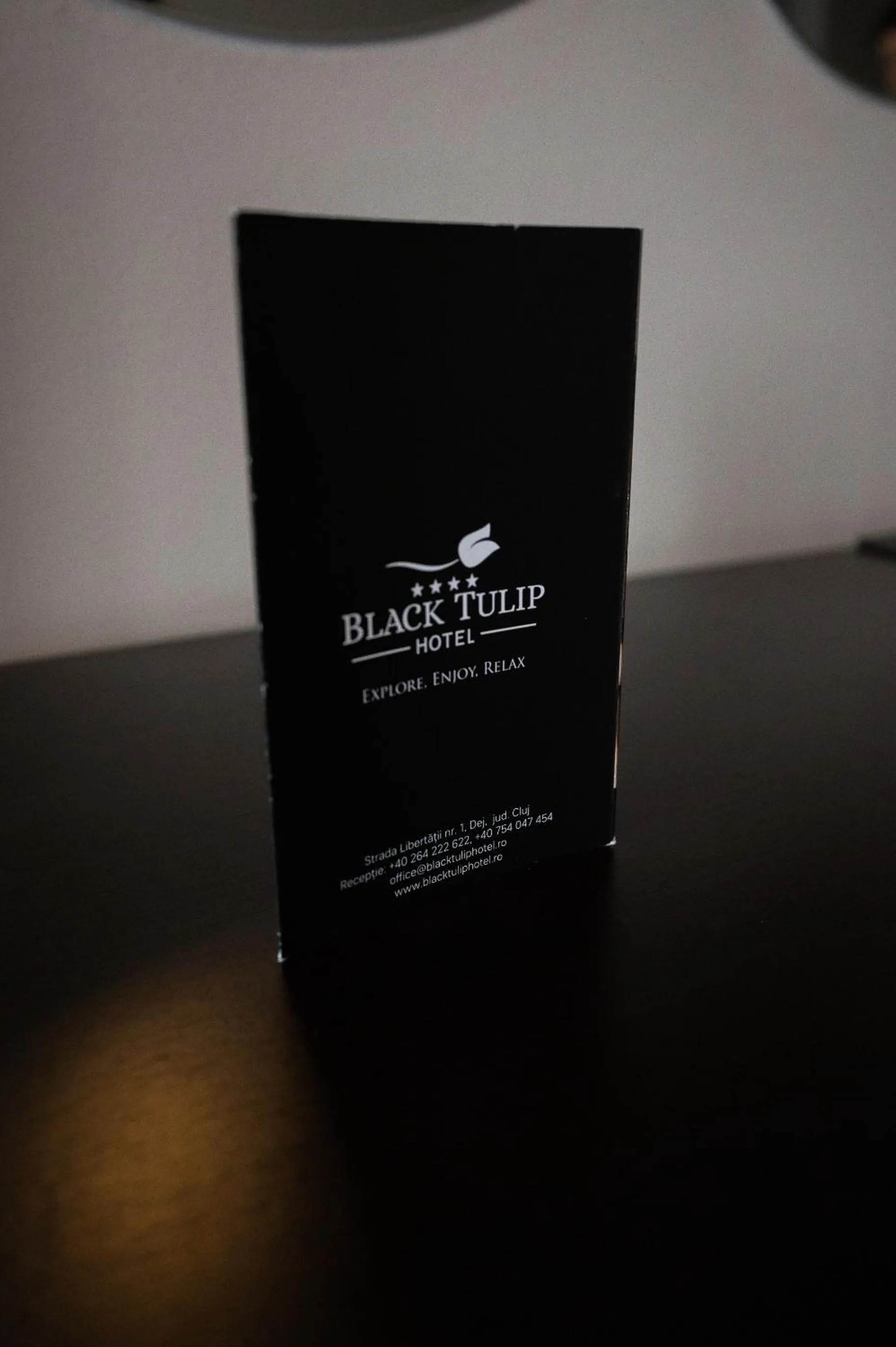 Property logo or sign in Black Tulip Hotel