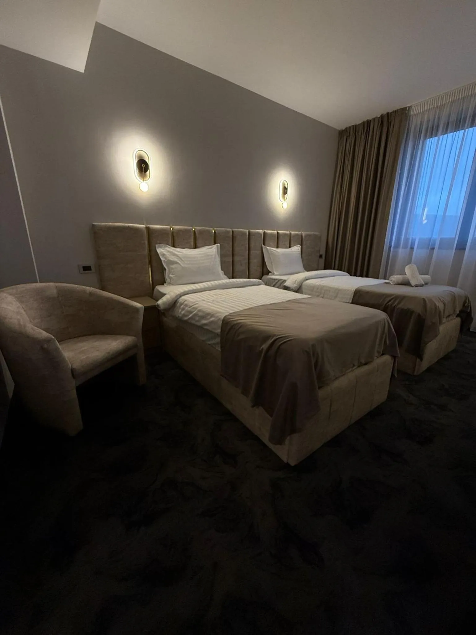 Bed in Black Tulip Hotel