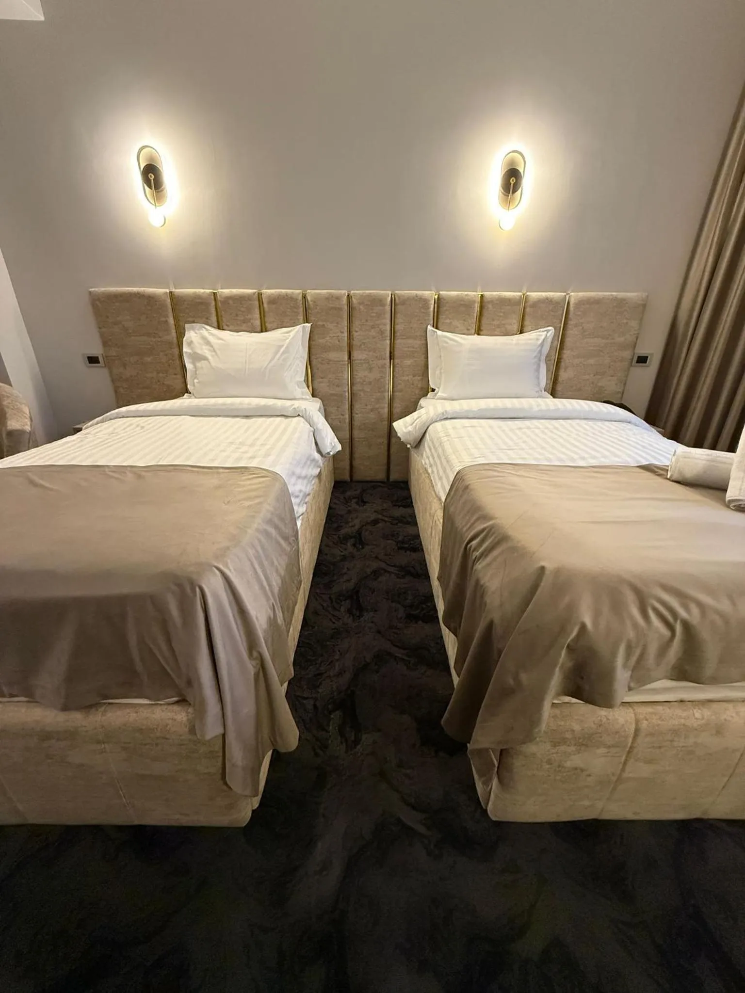 Bed in Black Tulip Hotel