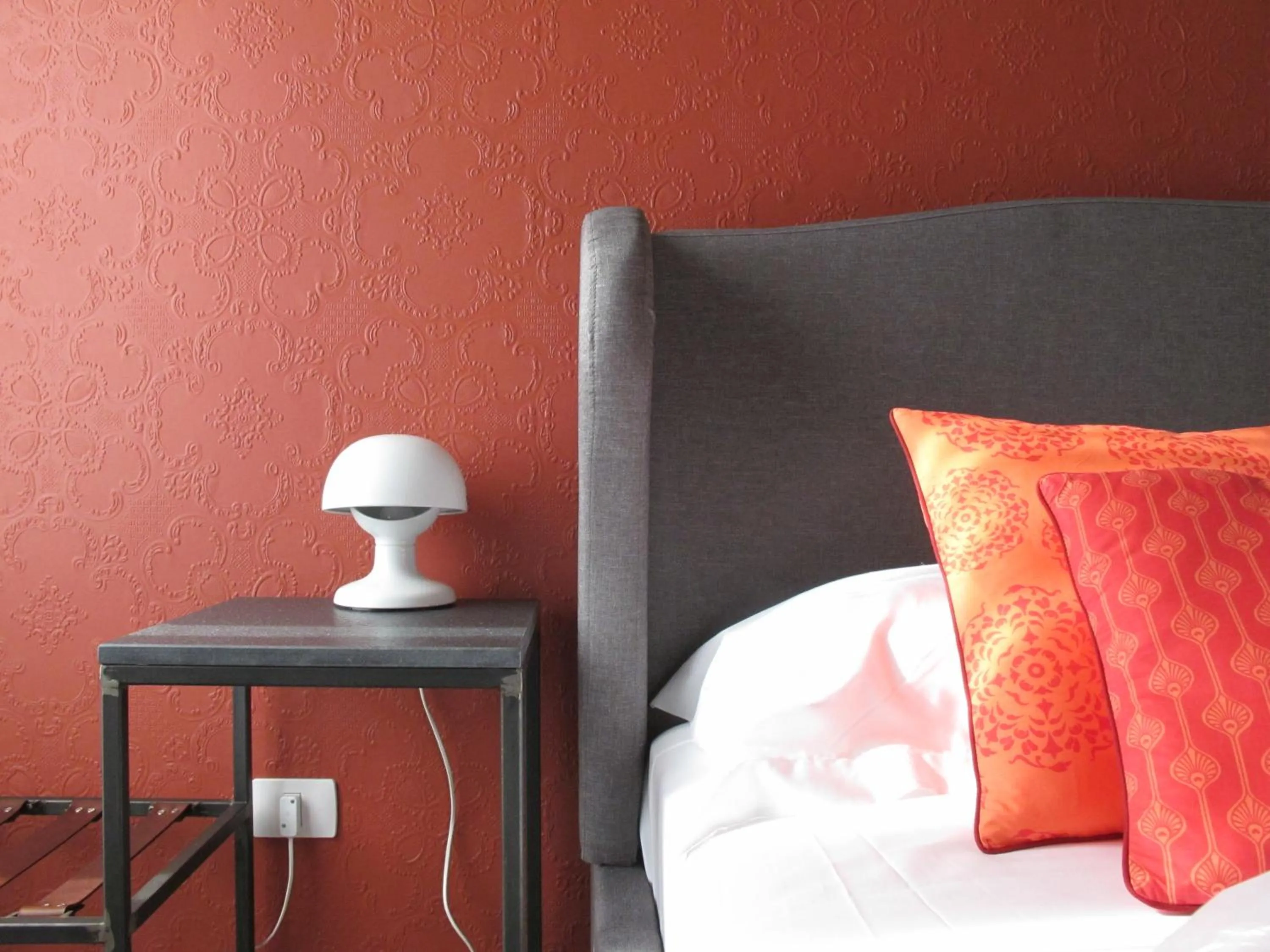 Bed in Avolio Tailored Rooms