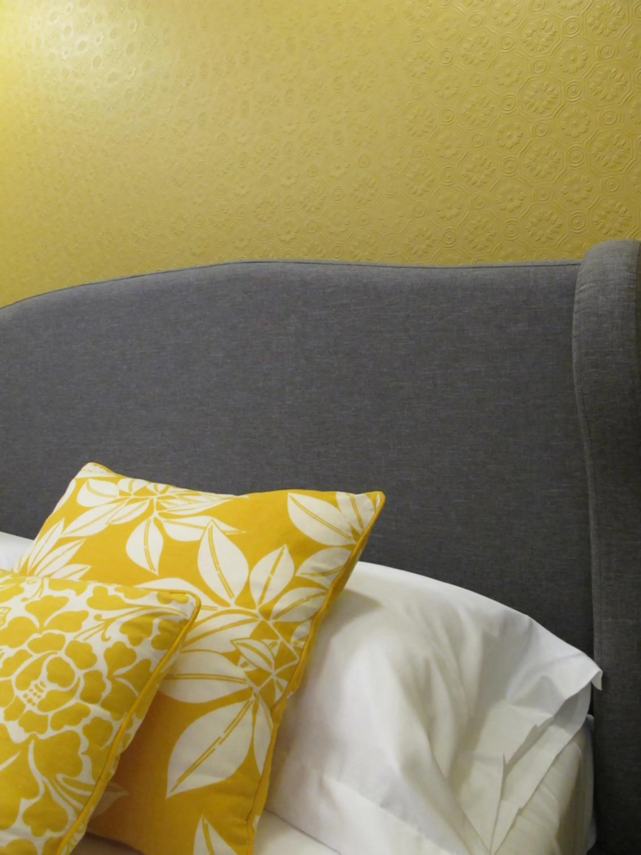 Bed in Avolio Tailored Rooms