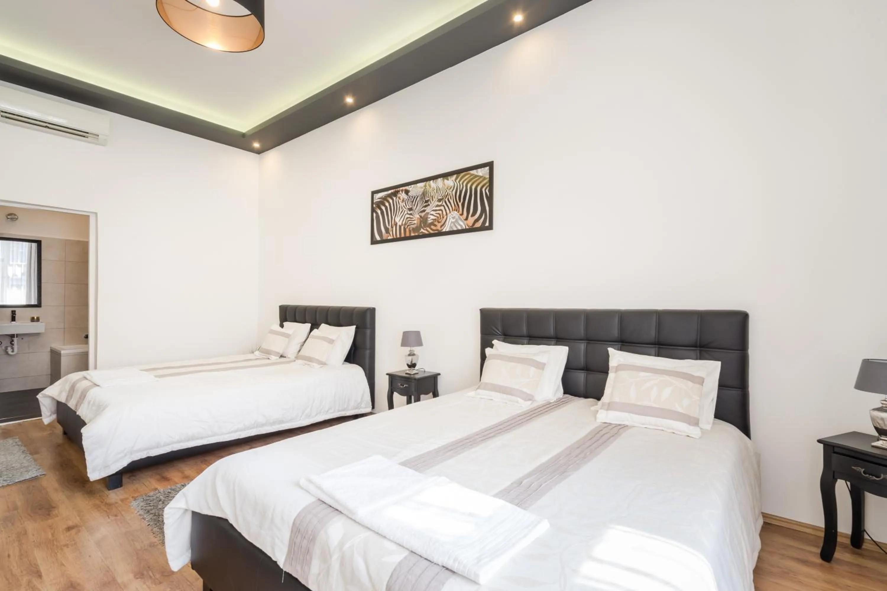 Bed in Real Apartments Zichy