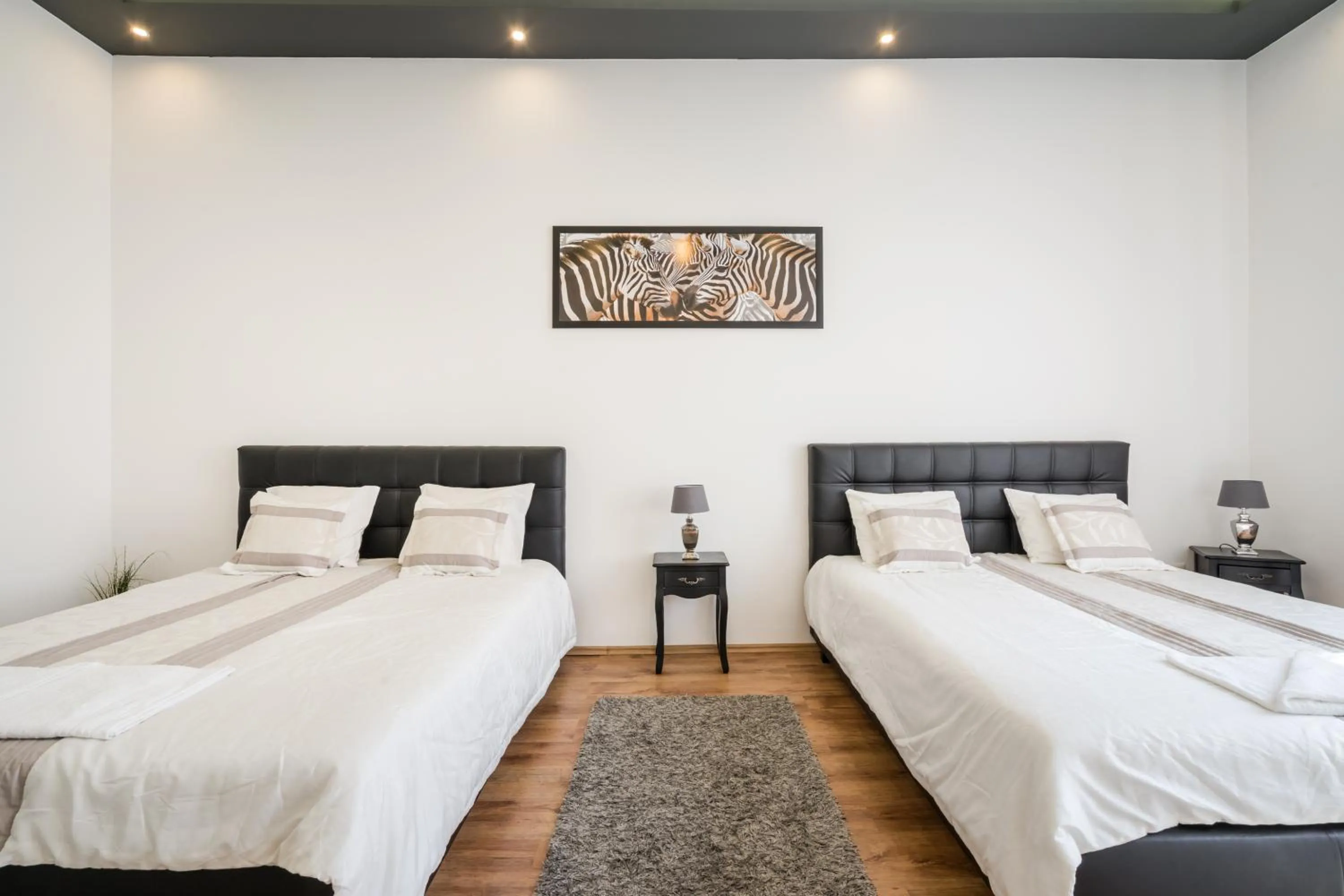 Bed in Real Apartments Zichy