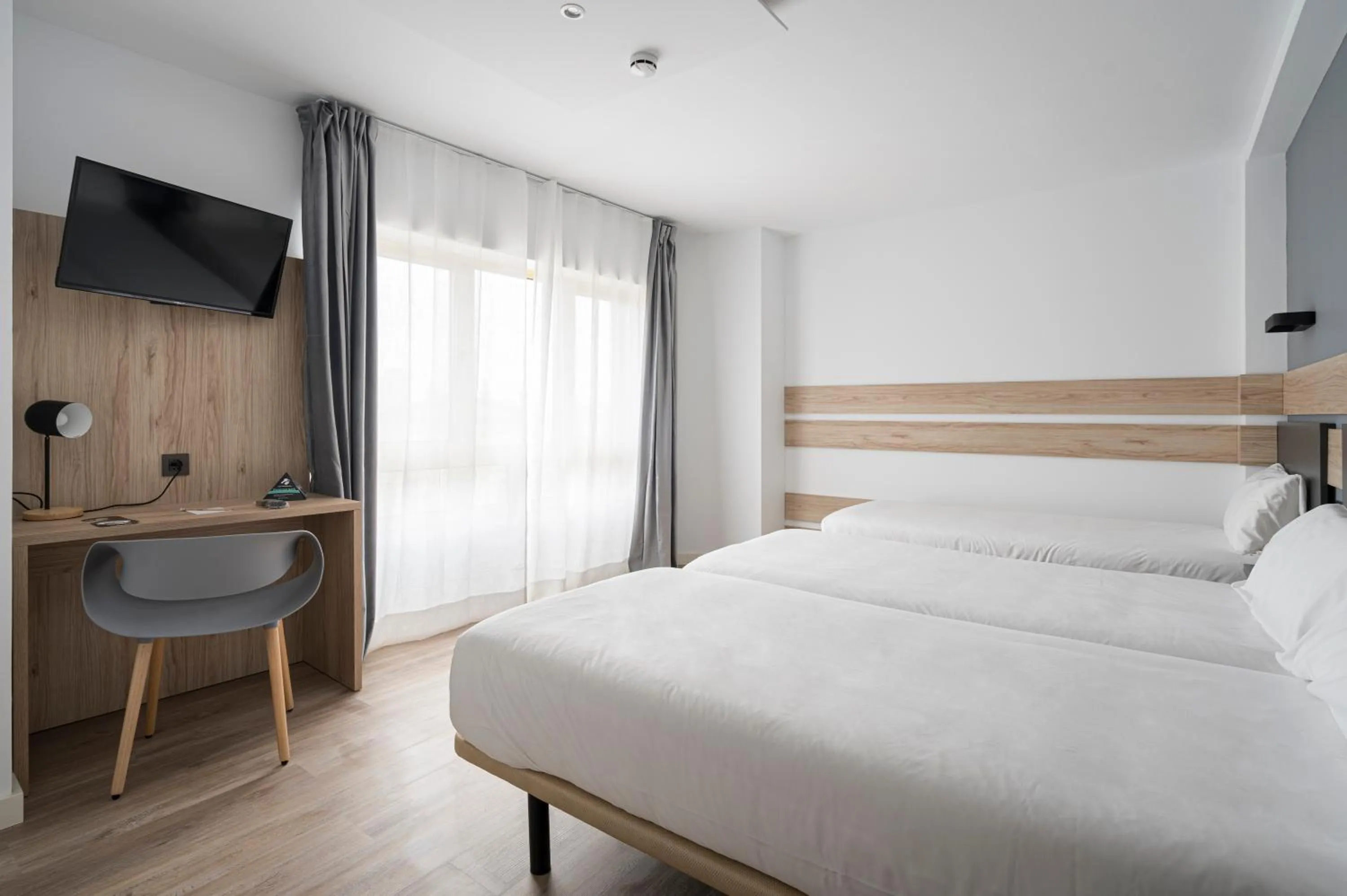 Photo of the whole room, Bed in Hotel Alda Centro Gijón
