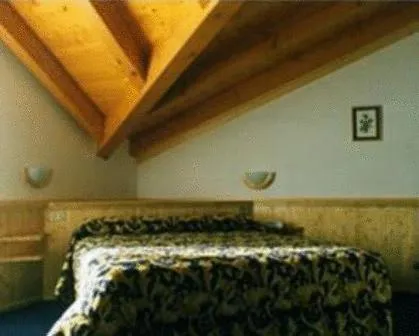 Bed in Albergo Gilda