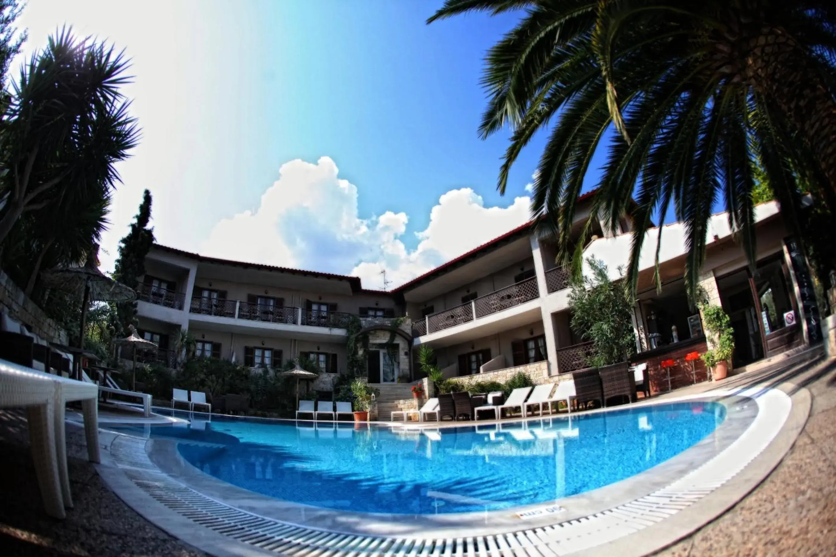 Swimming pool in Stamos Hotel Swimming pool in Stamos Hotel