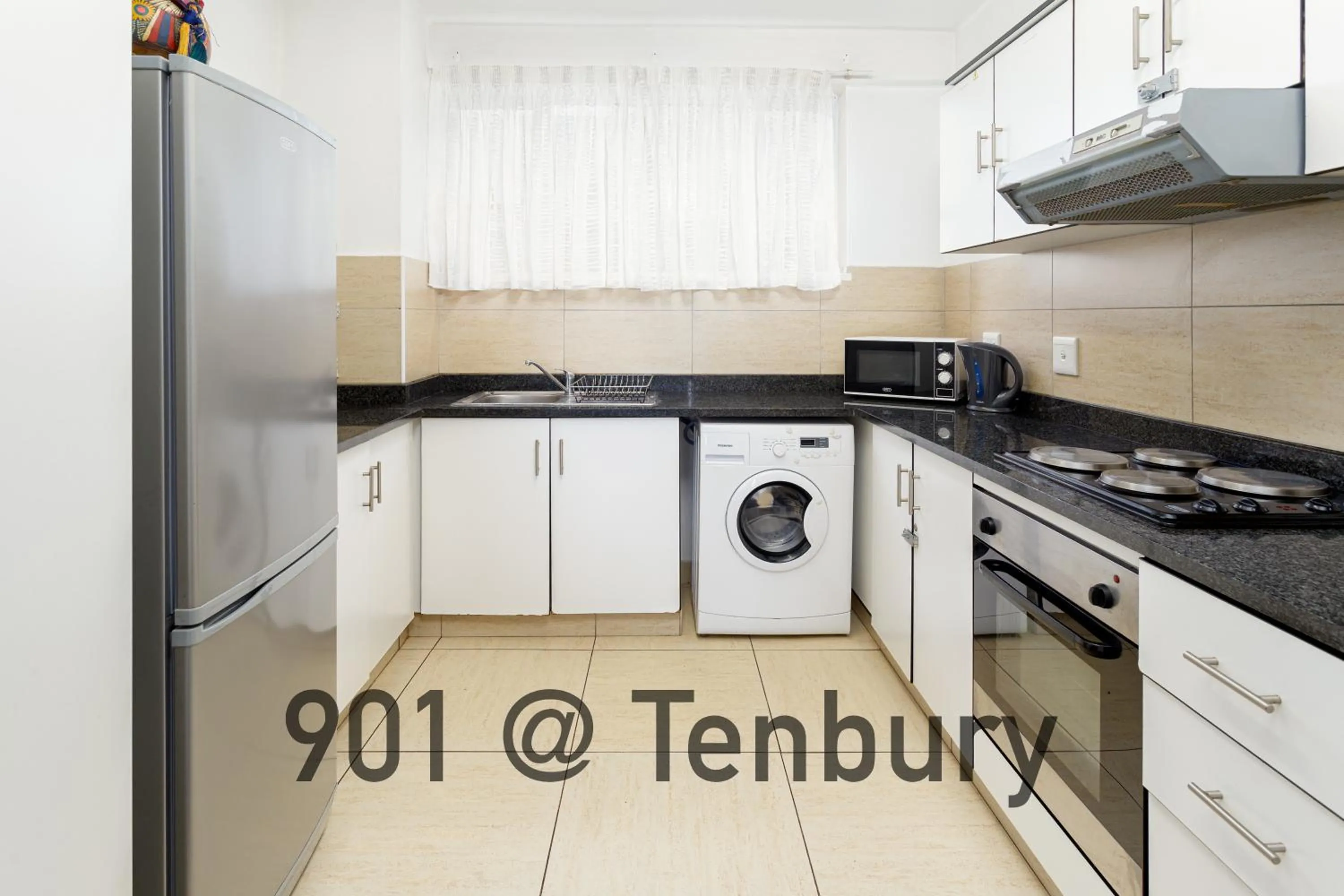 Kitchen or kitchenette in Tenbury Apartments