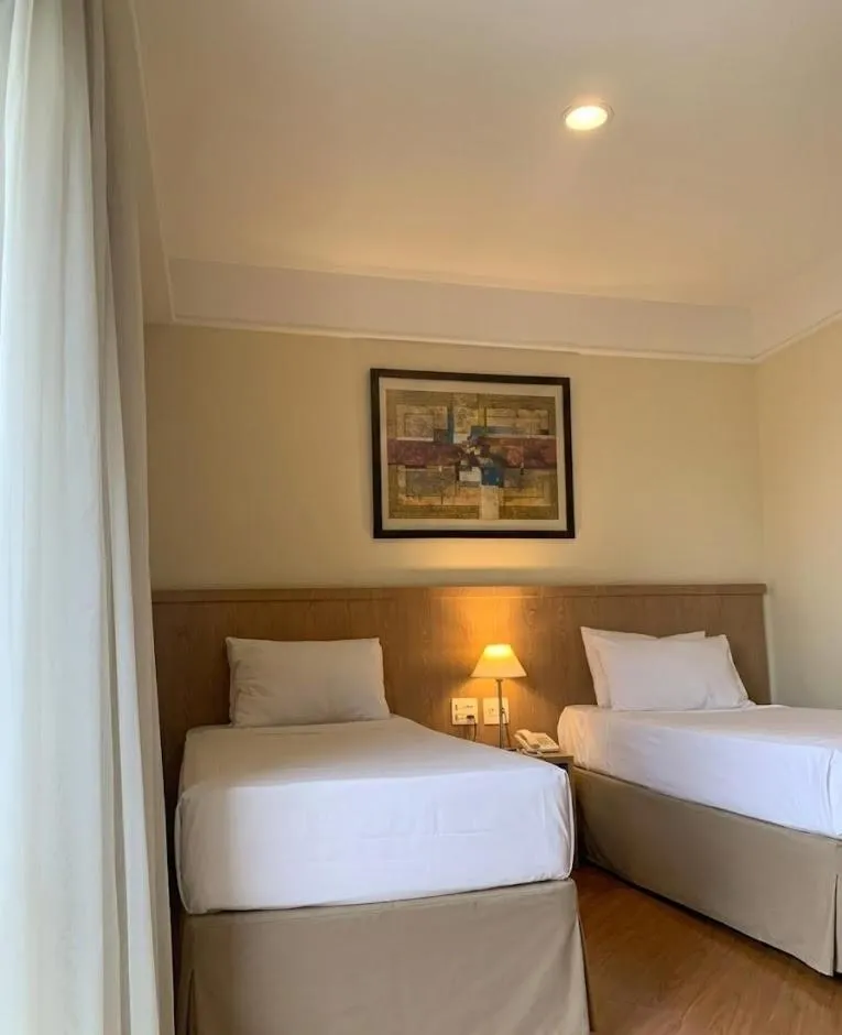 Bed in Bienal Suítes