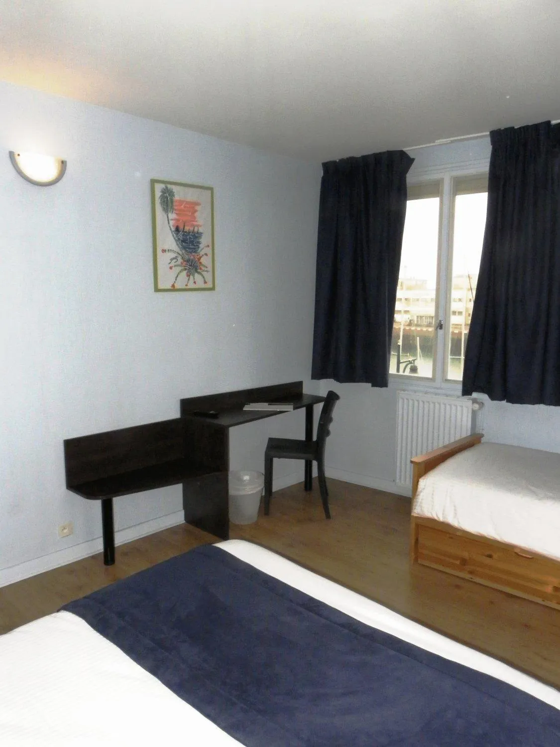 Photo of the whole room, Bed in Hôtel Du Port