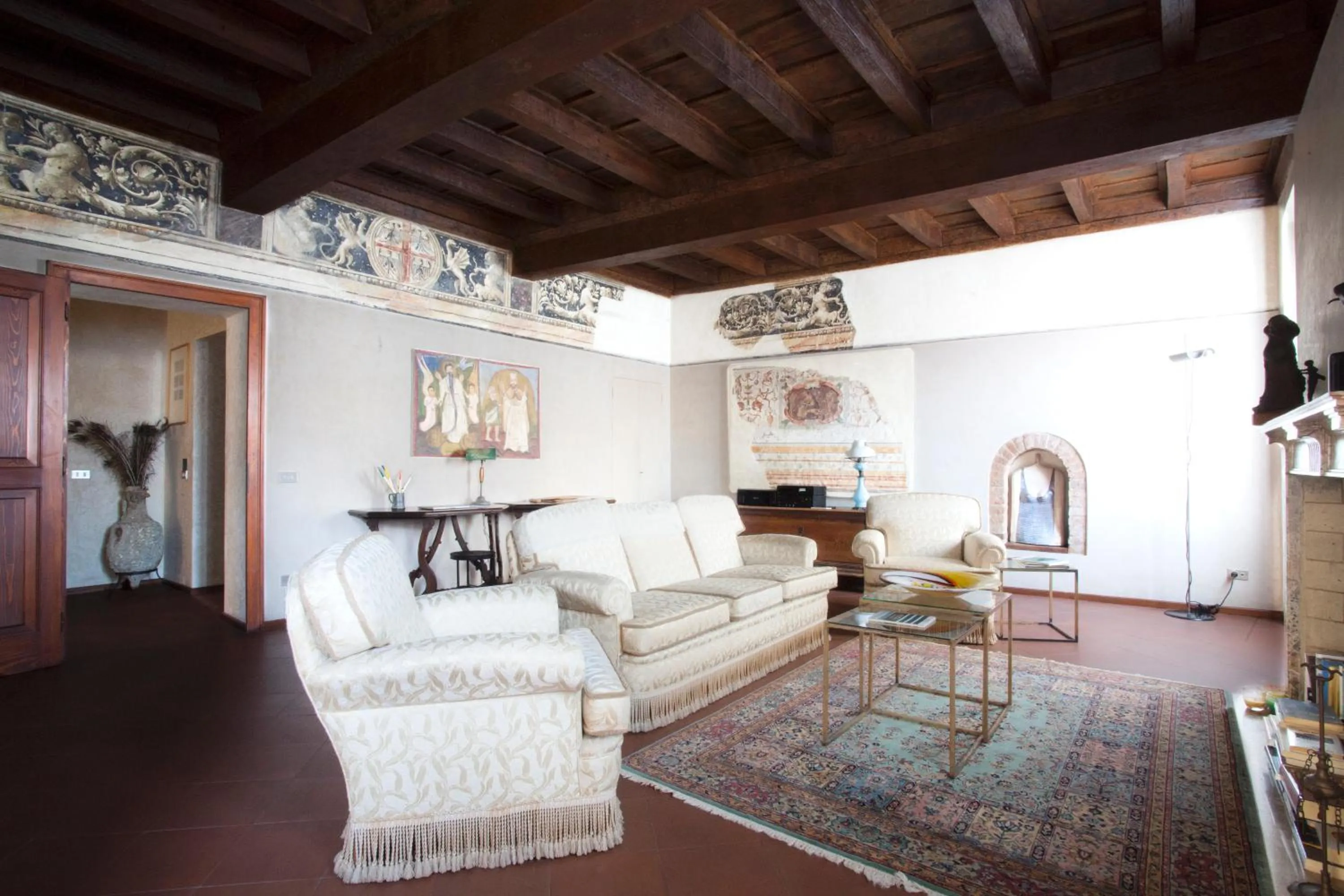 Communal lounge/ TV room in Casa del Pittore