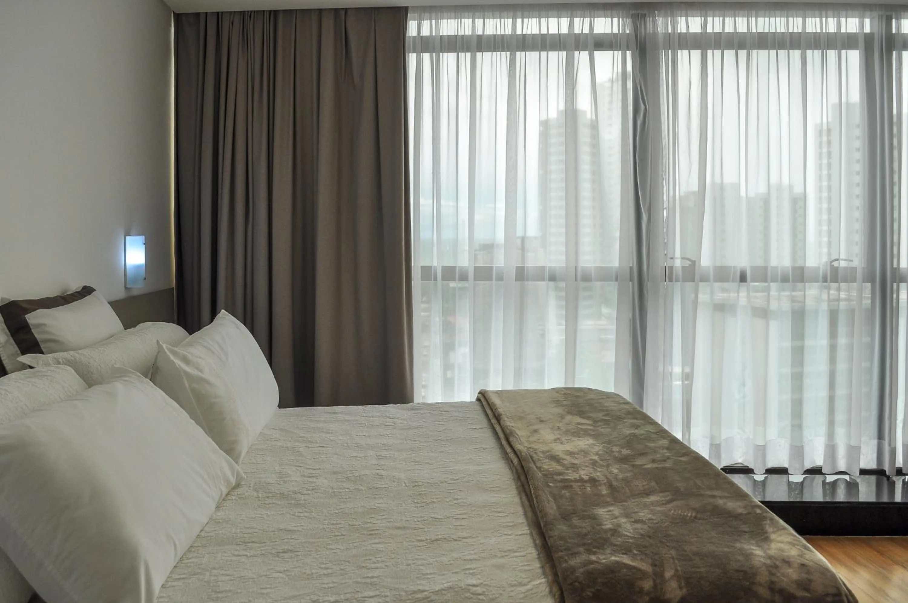 Bed in Marante Executive Hotel