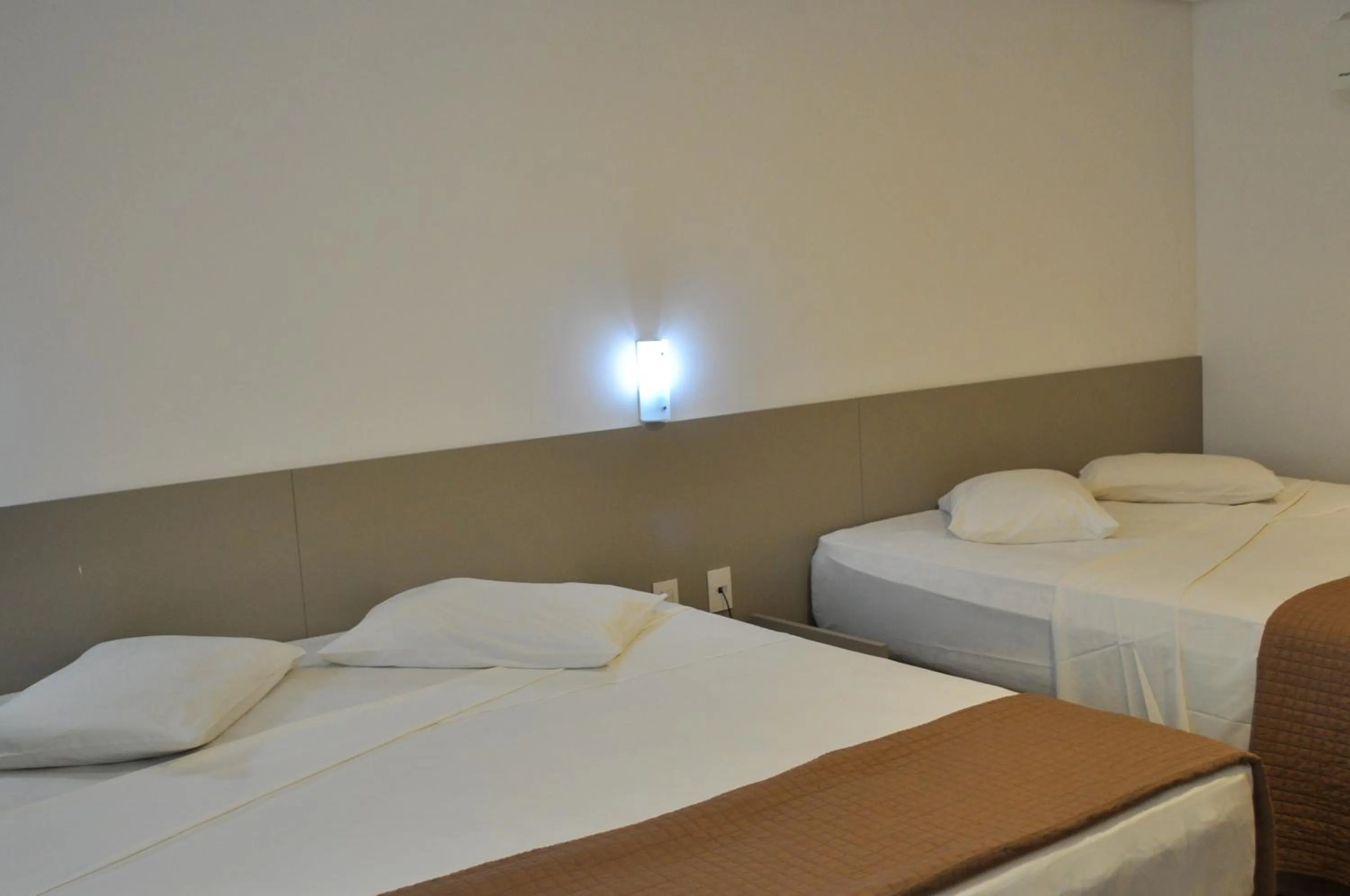 Bed in Marante Executive Hotel