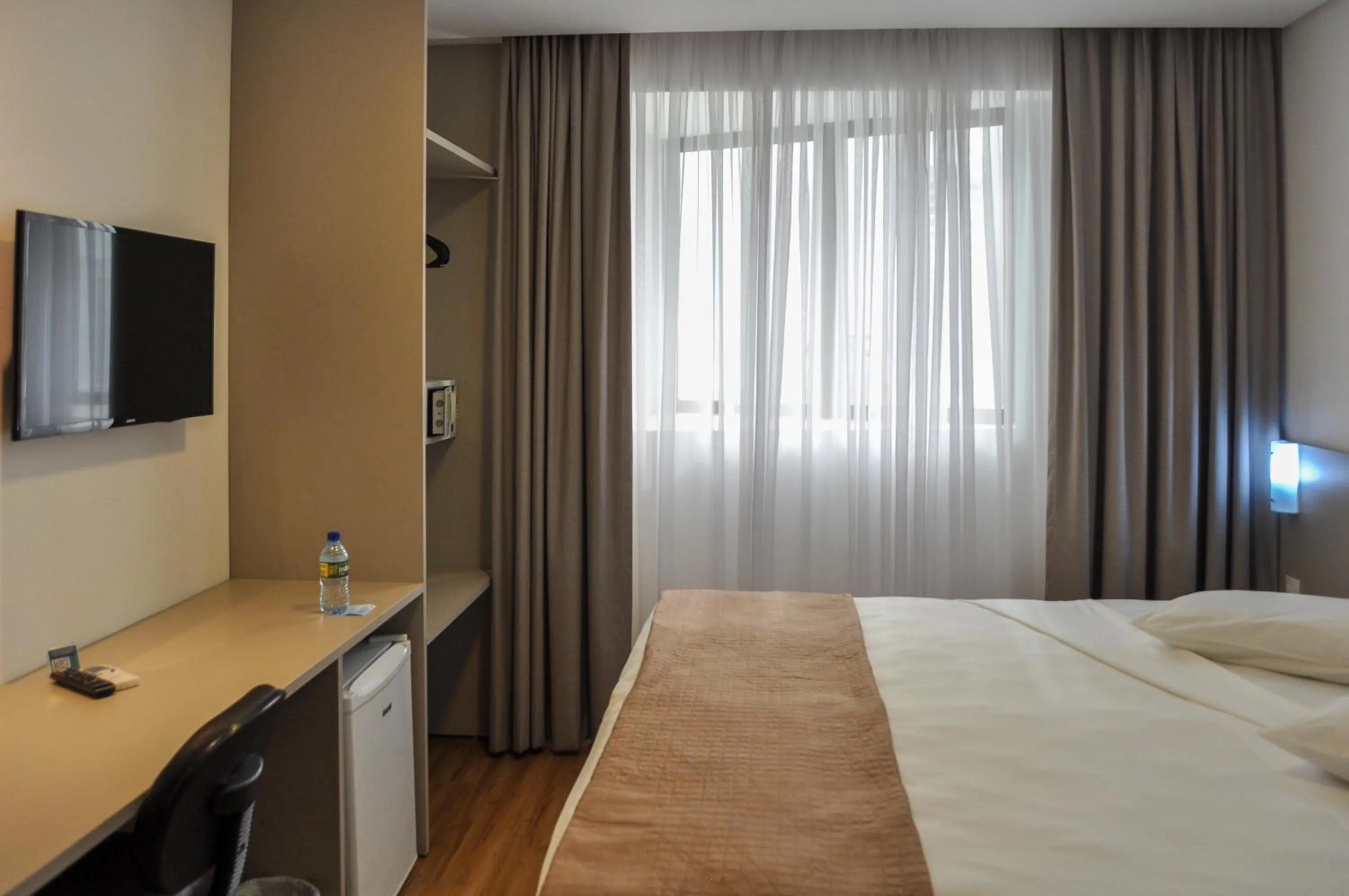 Bed in Marante Executive Hotel