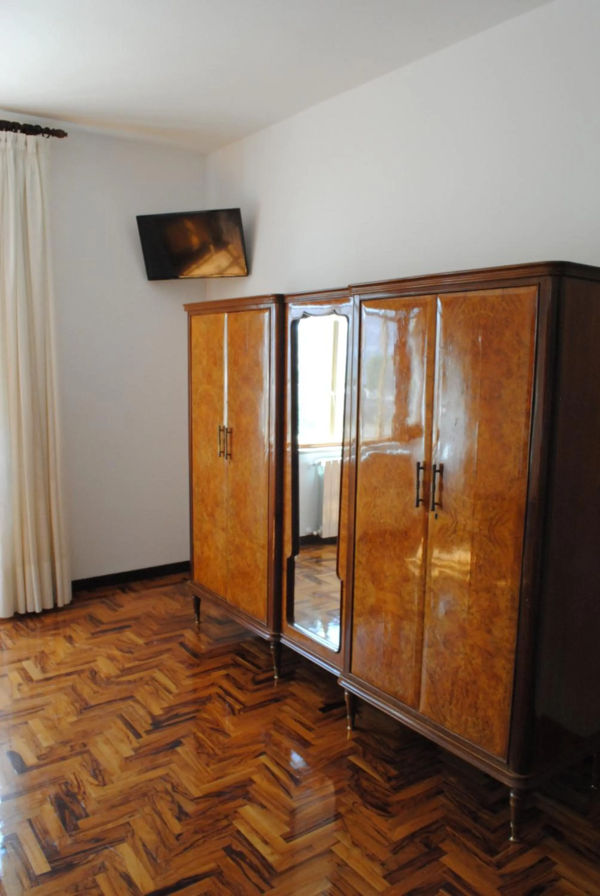 Photo of the whole room in Dimora Romano