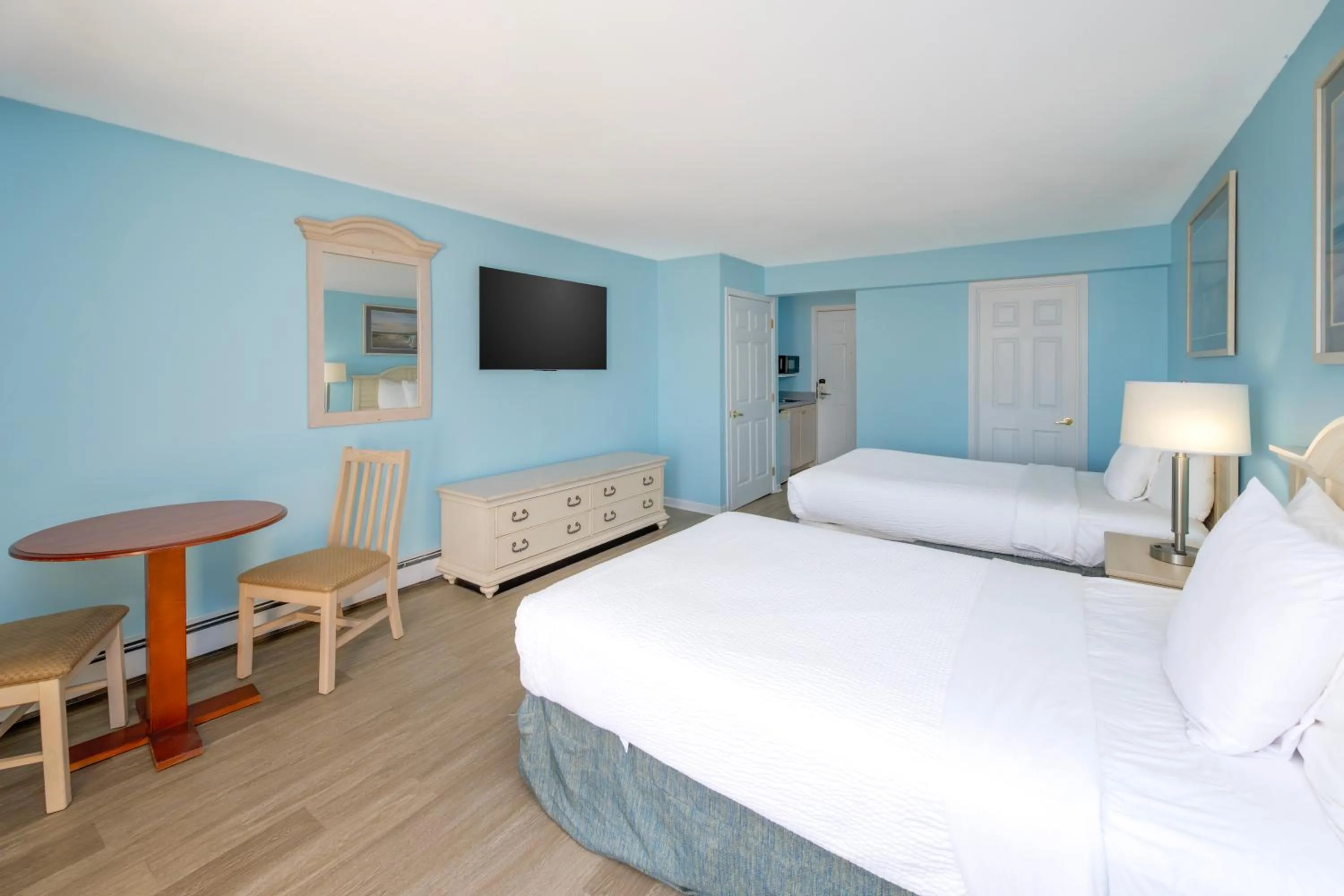 Bed in Drifting Sands Oceanfront Hotel