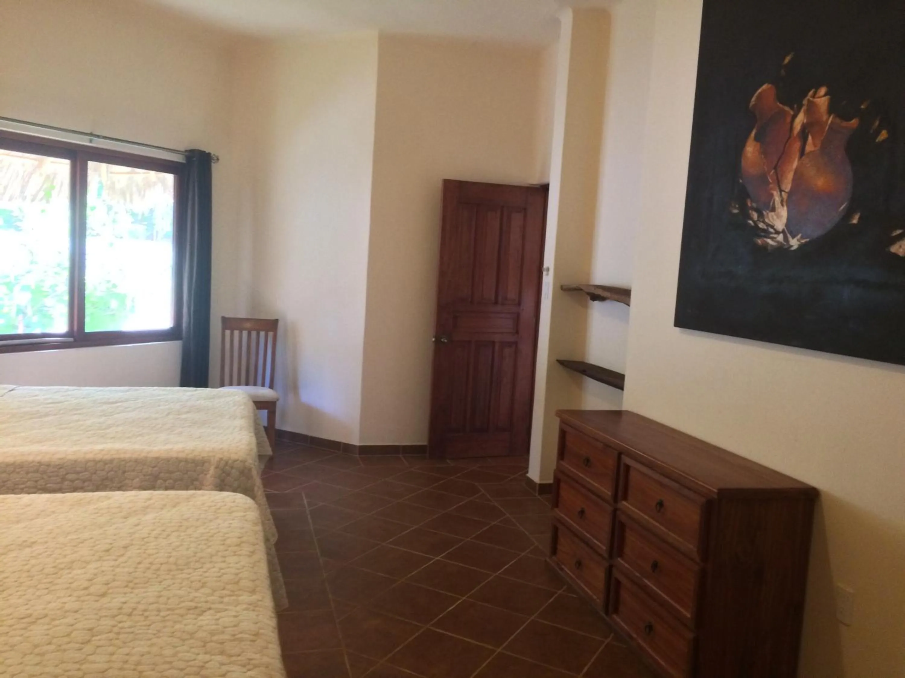 Bed in La Villa Mexicana by Diving Prestige