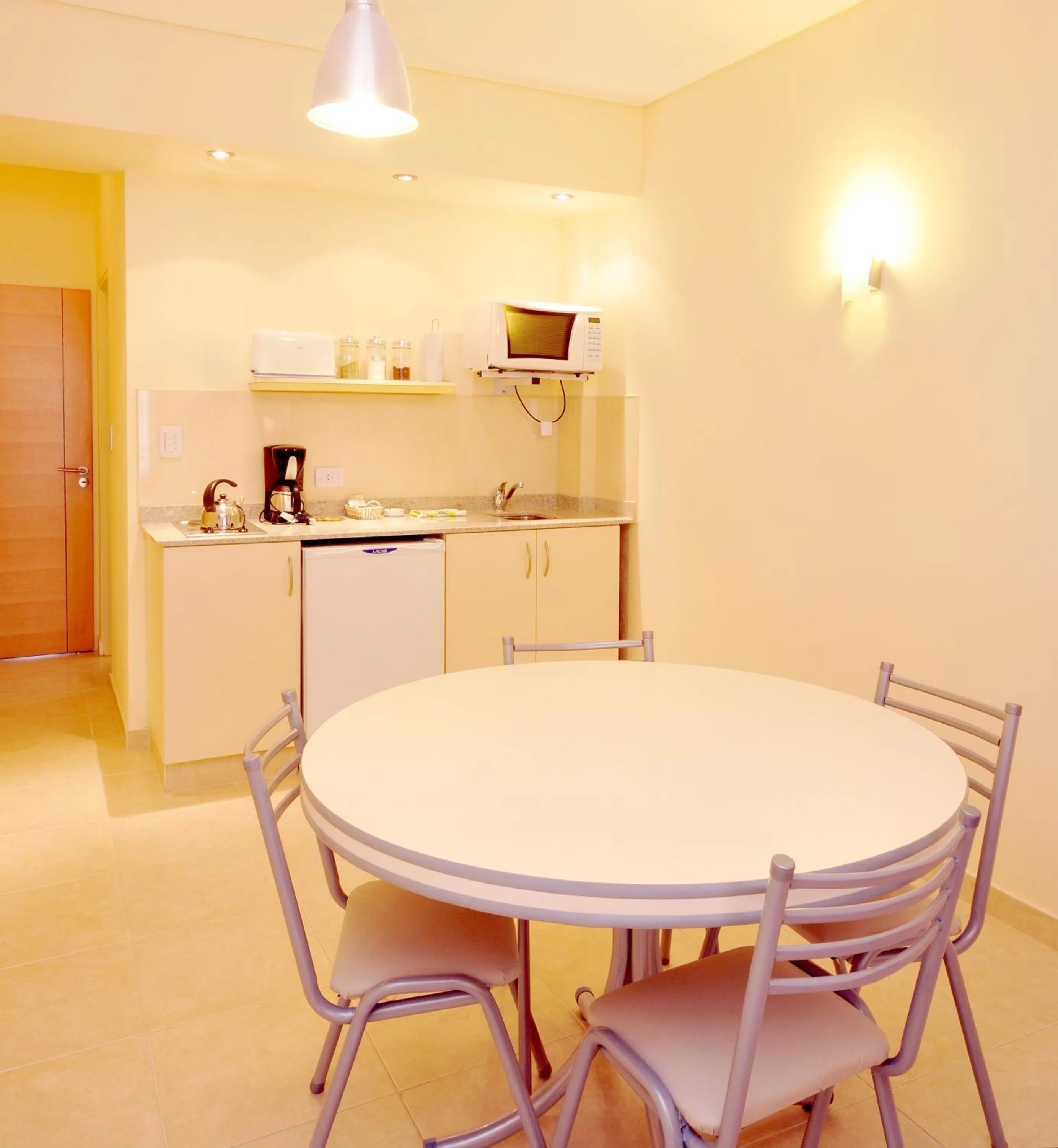 Kitchen or kitchenette in Orion Apartamentos