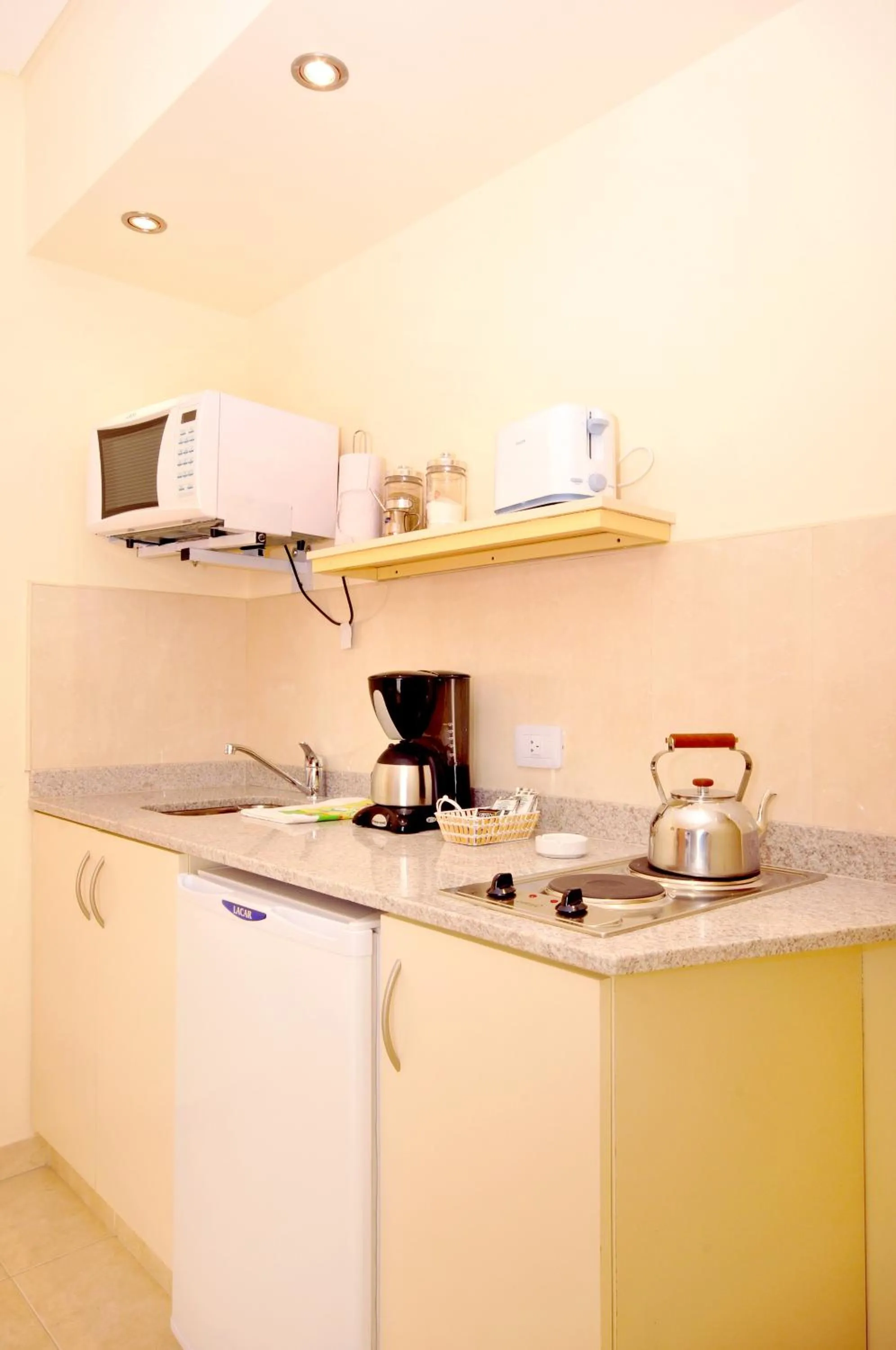 Kitchen or kitchenette in Orion Apartamentos
