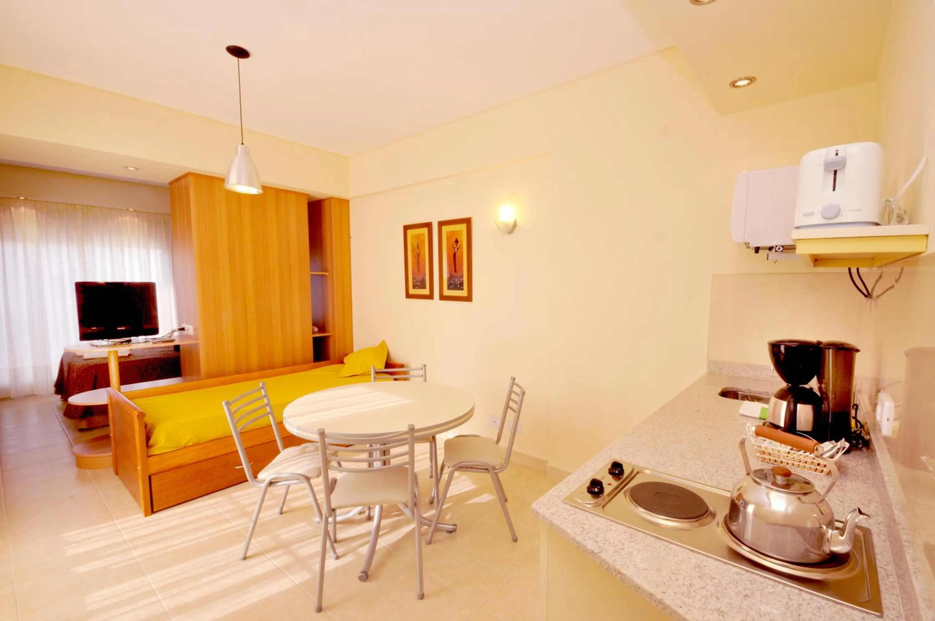 Kitchen or kitchenette in Orion Apartamentos
