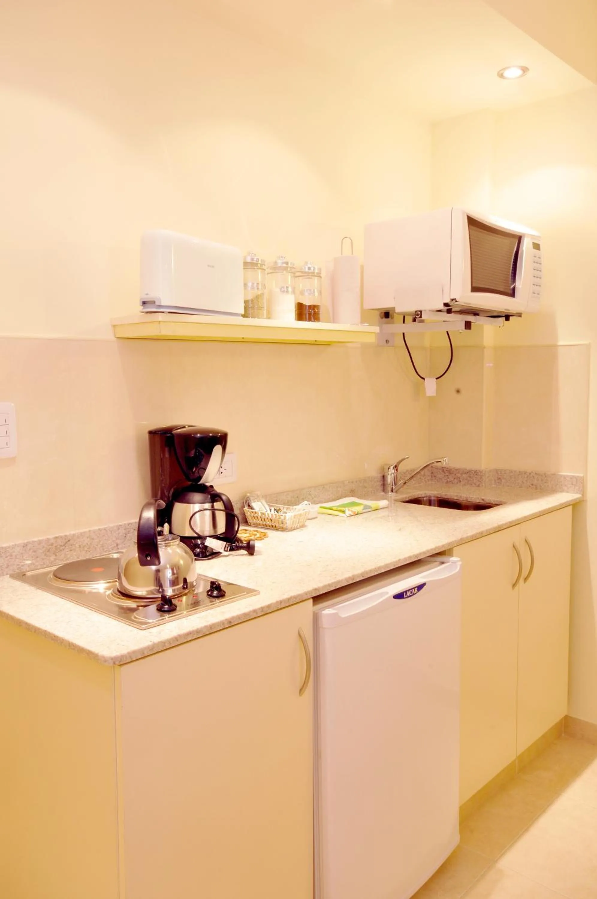 Kitchen or kitchenette in Orion Apartamentos