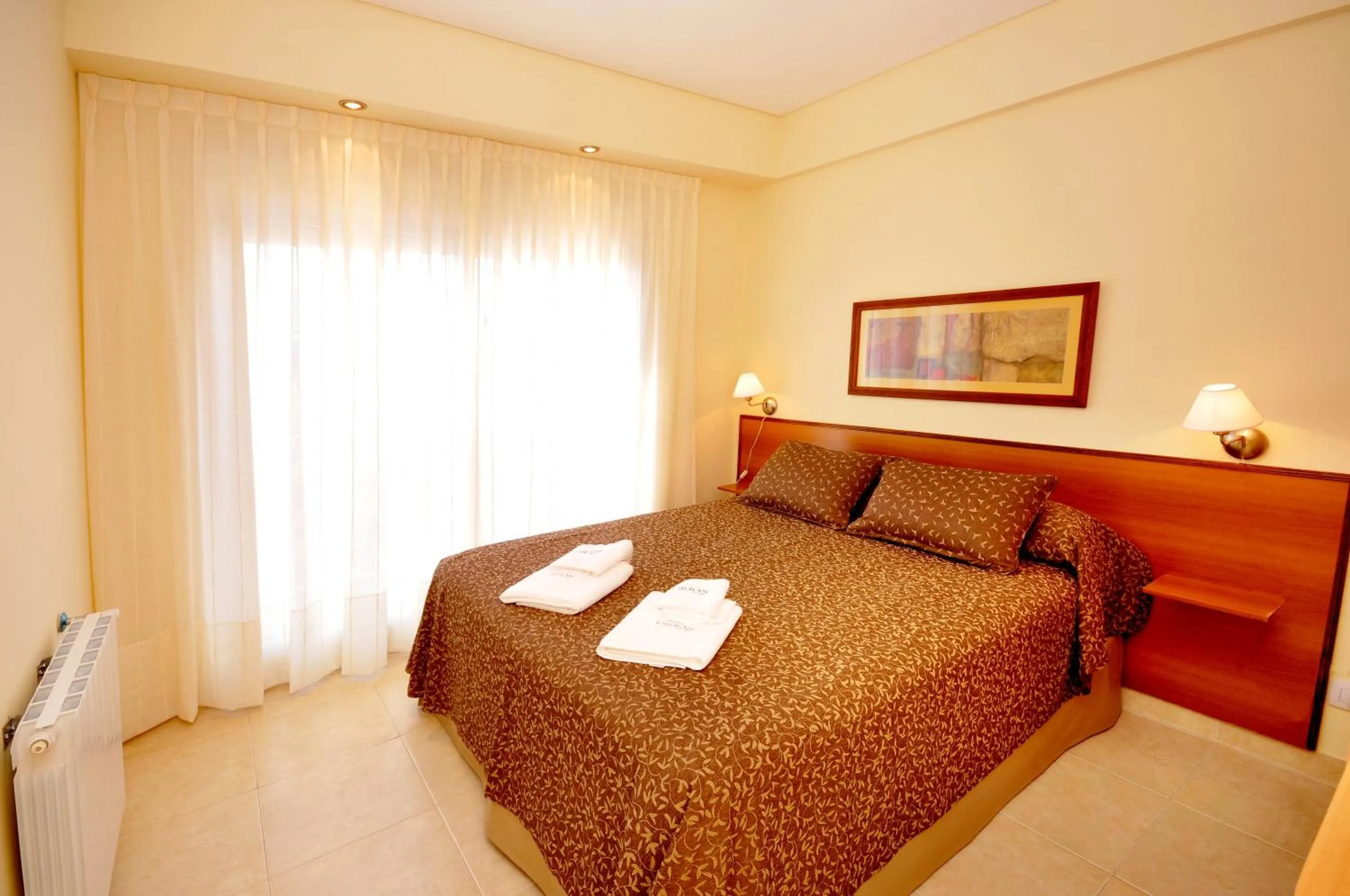Bed in Orion Apartamentos