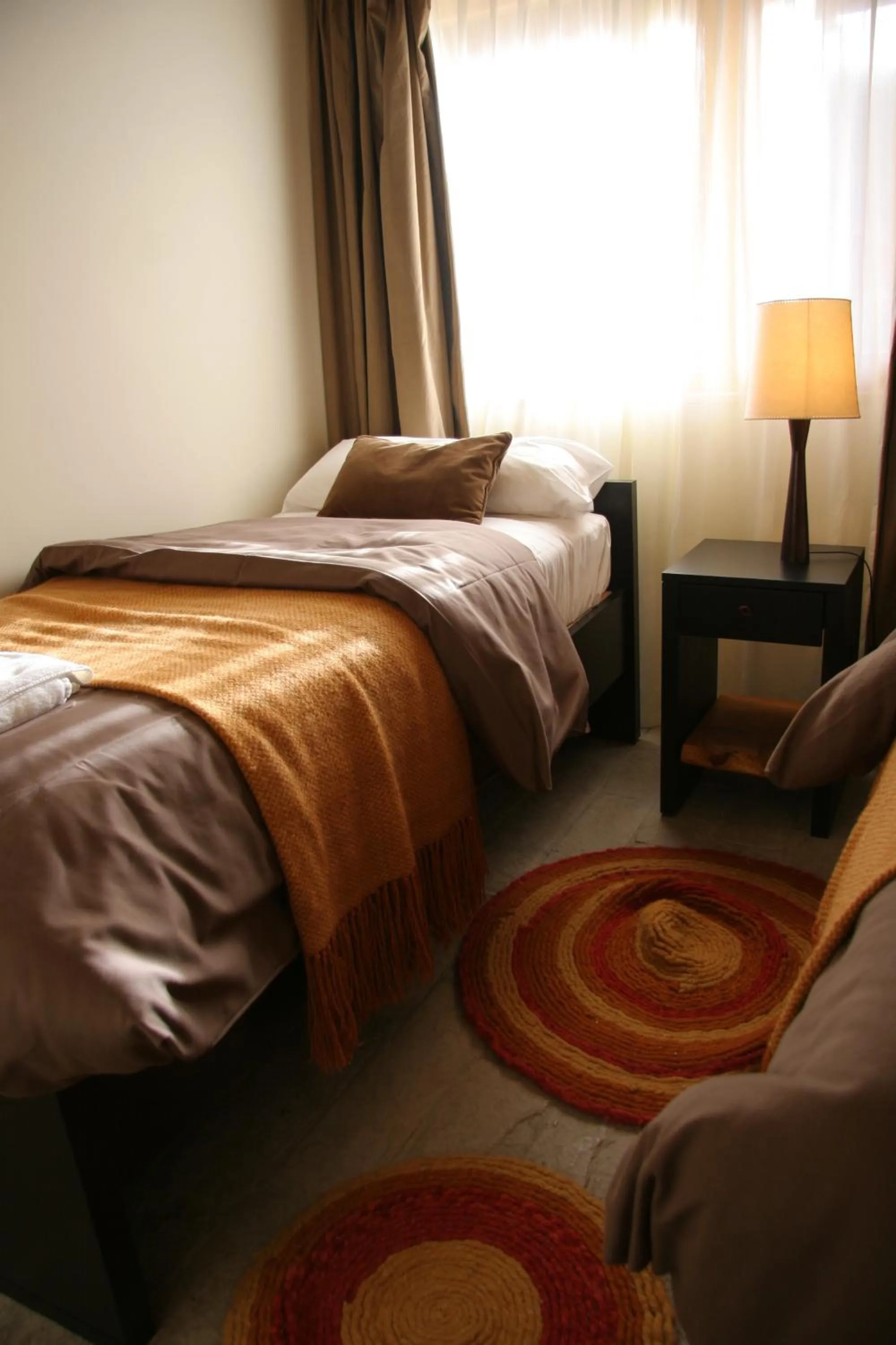 Bed in Galileo Boutique Hotel