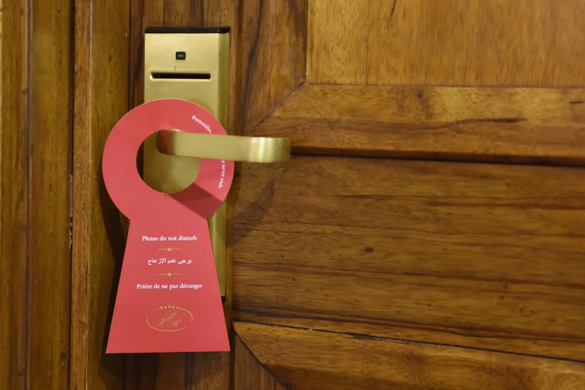 Property logo or sign in Portemilio Hotel & Resort