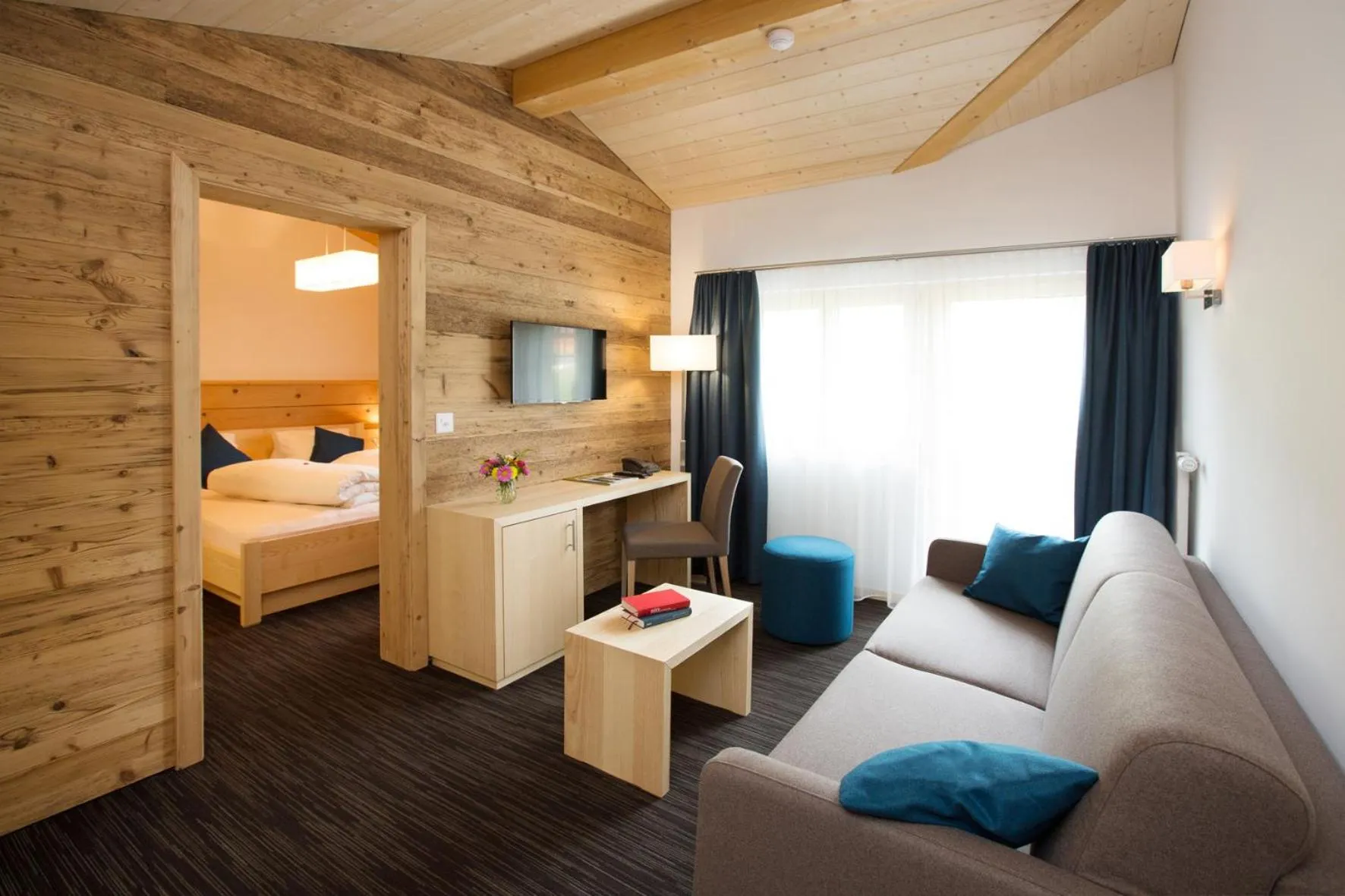 Living room, Bed in Boutique-Hotel Vincenz