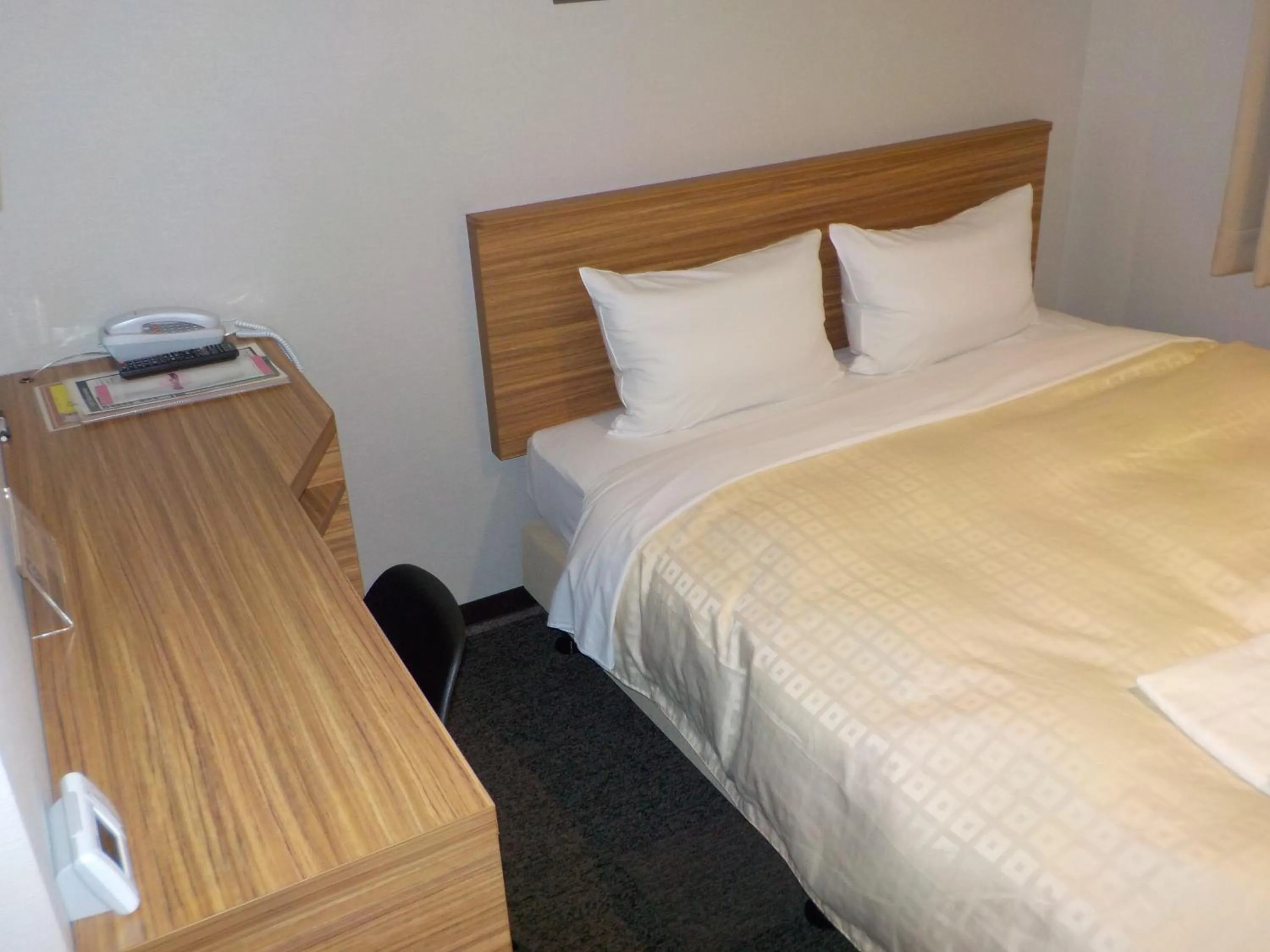 Bedroom, Bed in Hotel Crown Hills Katsuta Nigo Motomachiten