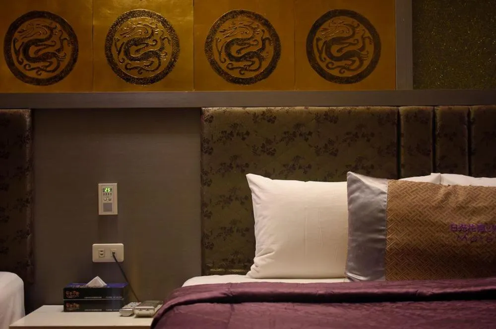 Bed in Sun Garden Motel