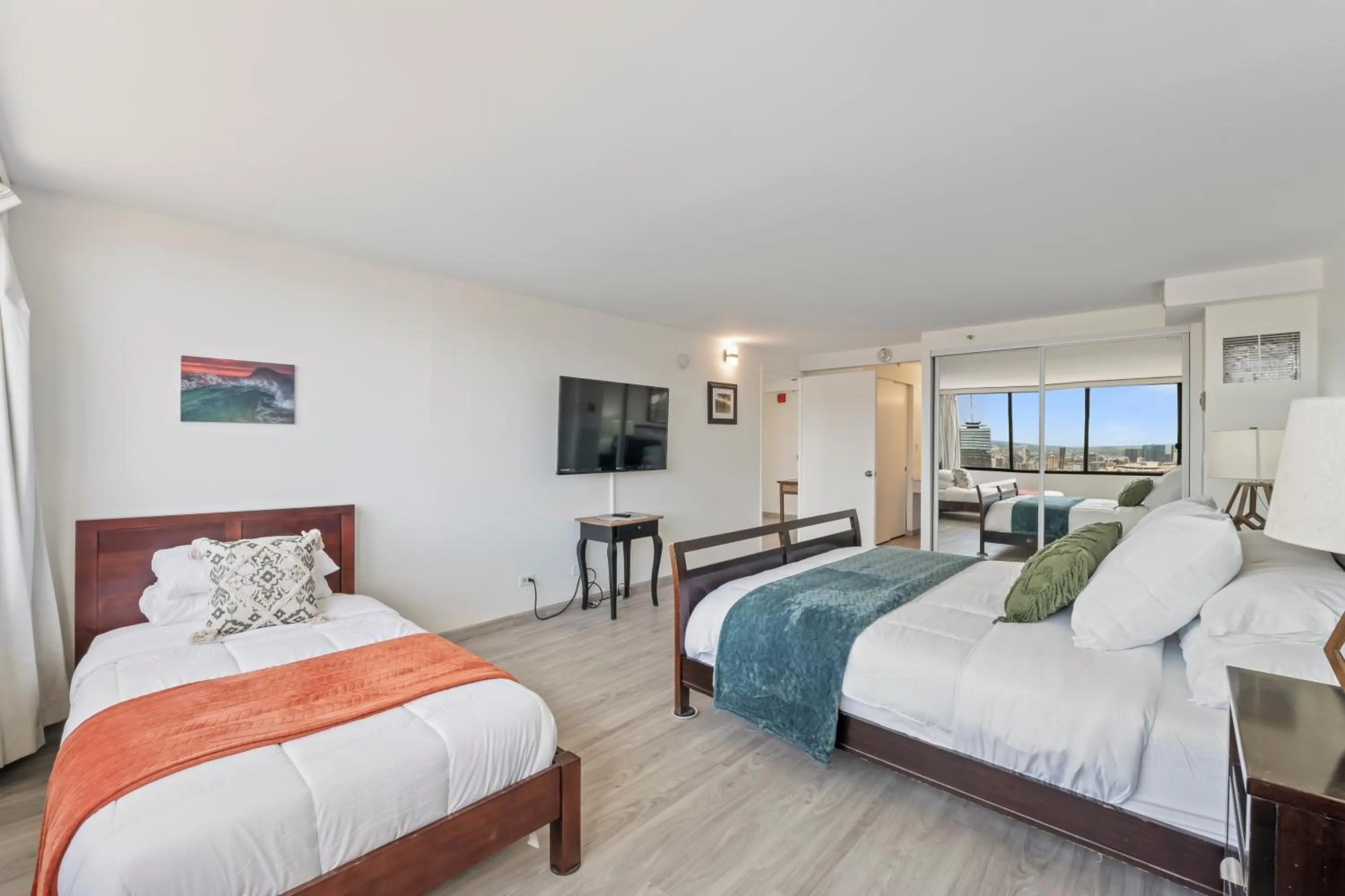 Bed in Hawaiian Monarch Penthouse 104 by Hawaii Ocean Club