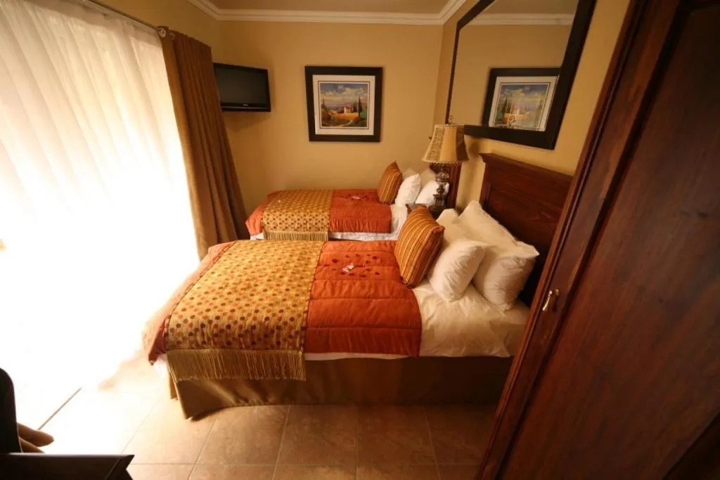 Photo of the whole room in Le Cozmo Guesthouse