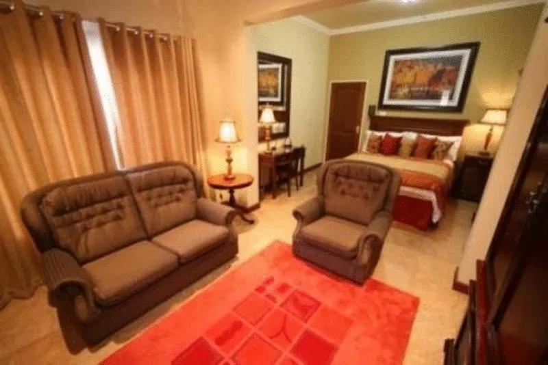 Photo of the whole room in Le Cozmo Guesthouse