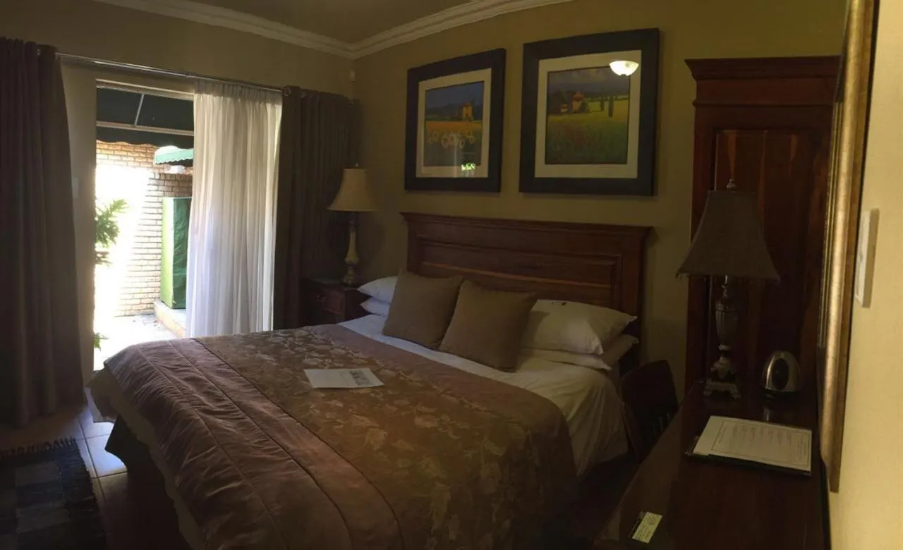 Bed in Le Cozmo Guesthouse