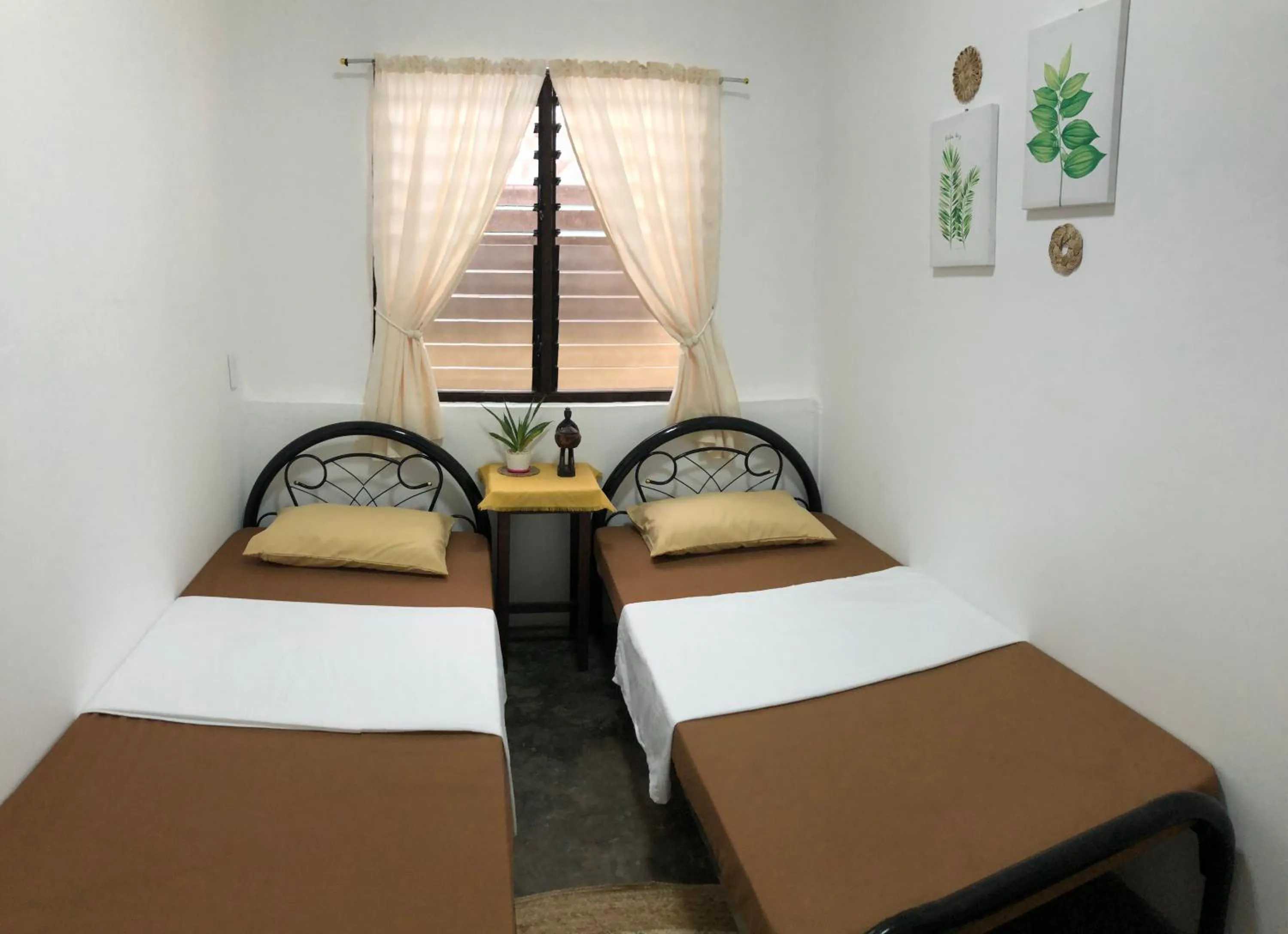 Bed in Hiraya Homestay Coron