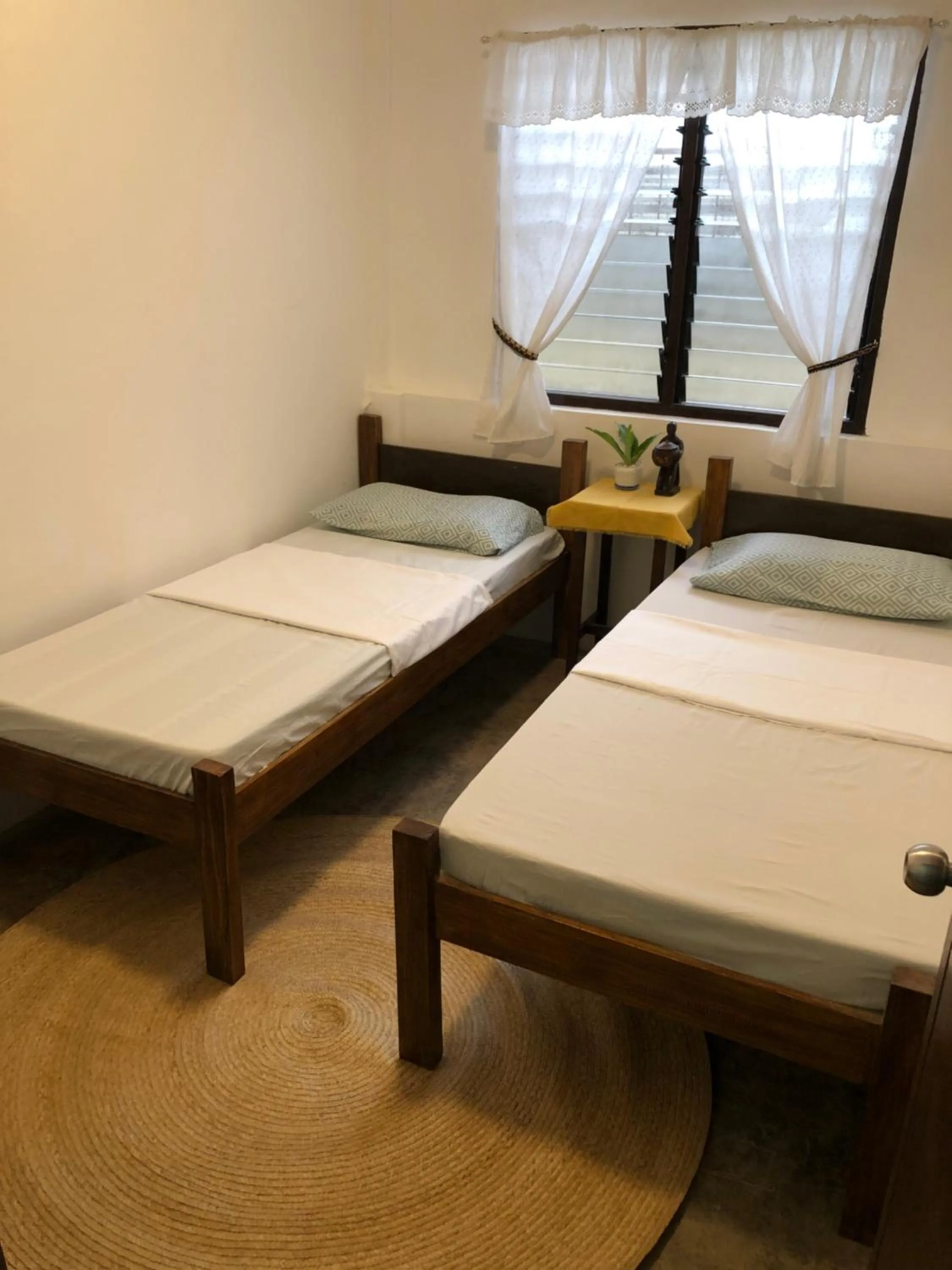Bed in Hiraya Homestay Coron