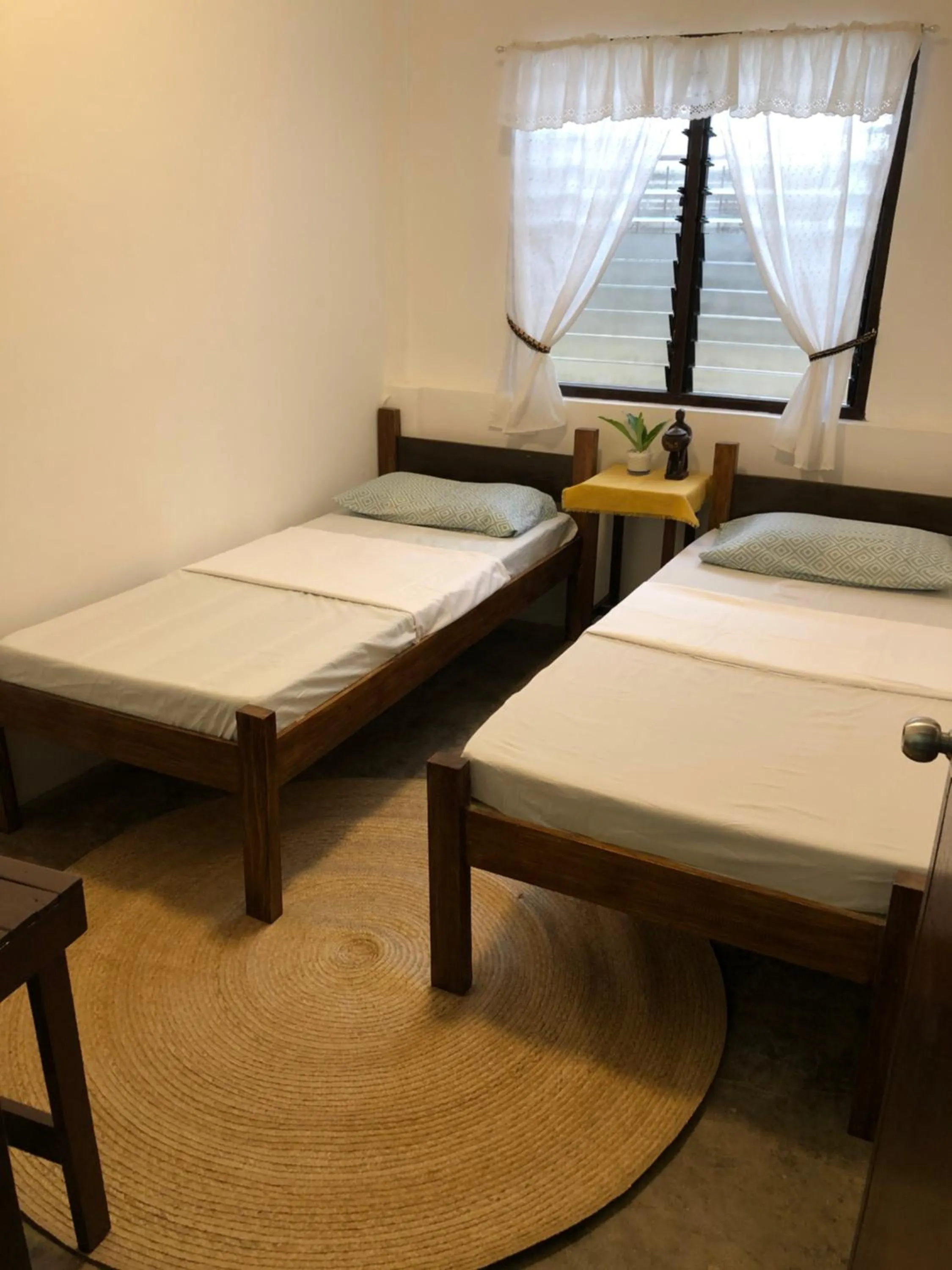 Bed in Hiraya Homestay Coron