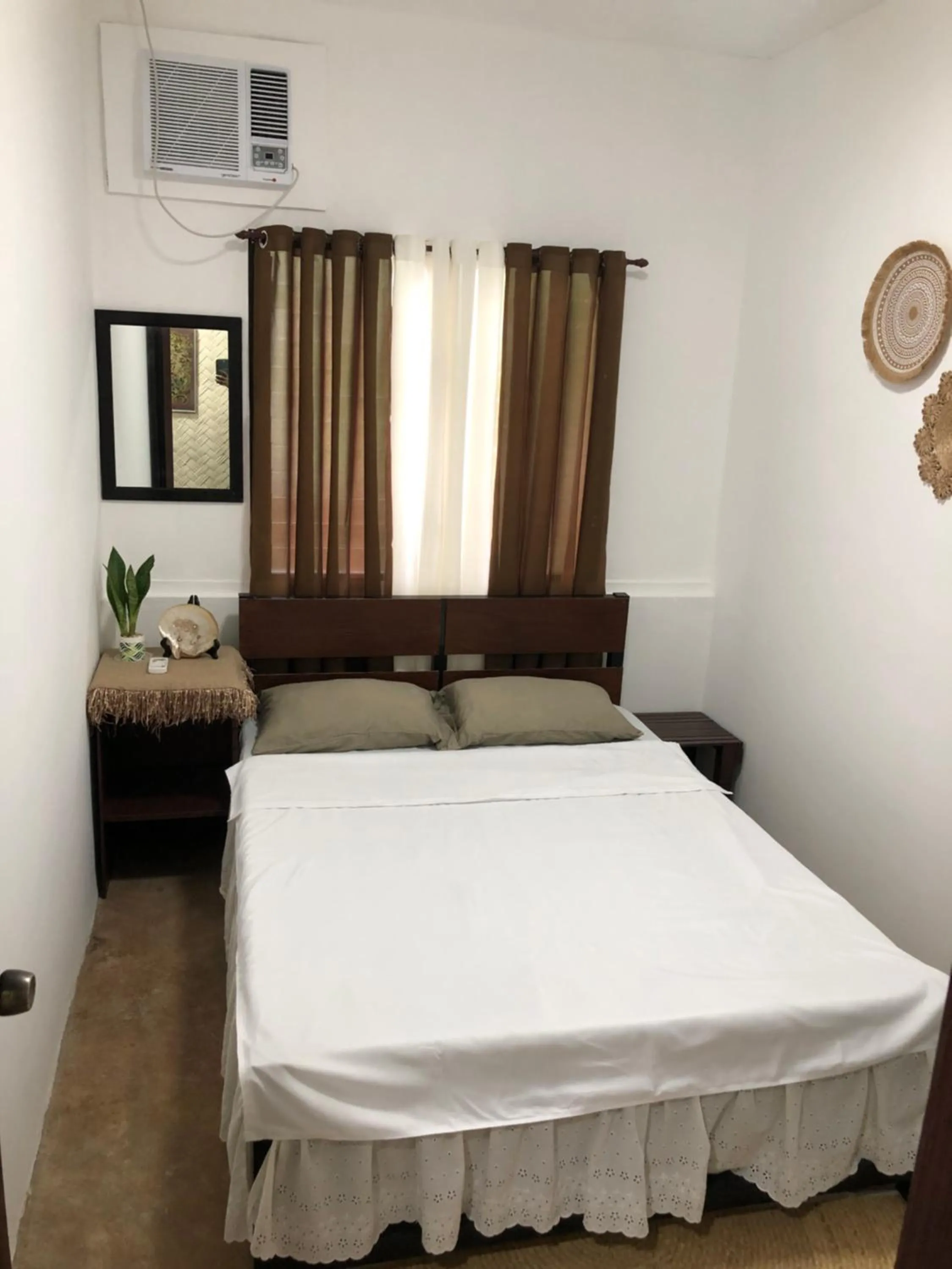 Bed in Hiraya Homestay Coron
