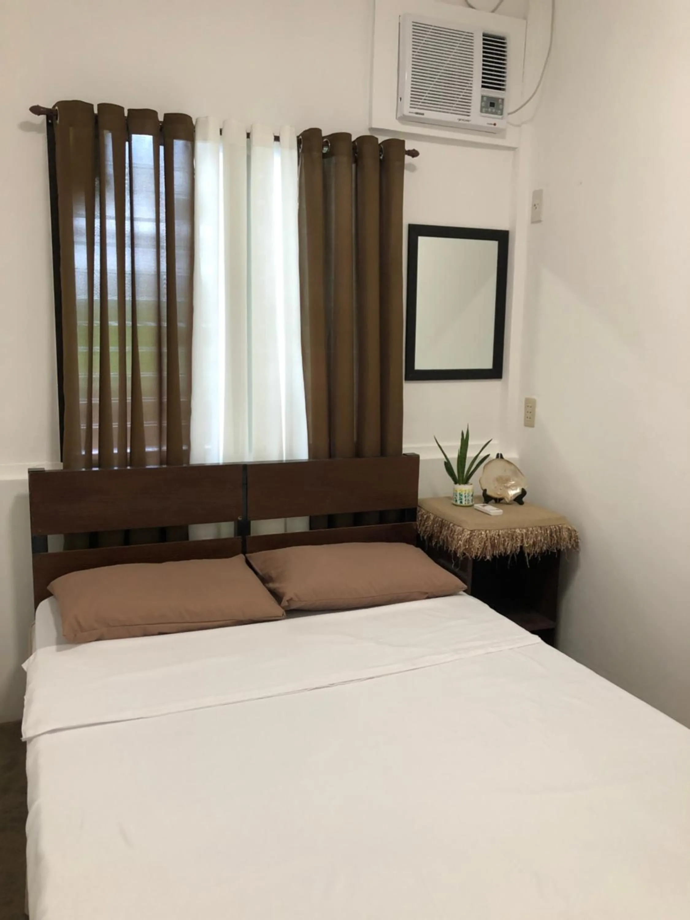 Bed in Hiraya Homestay Coron