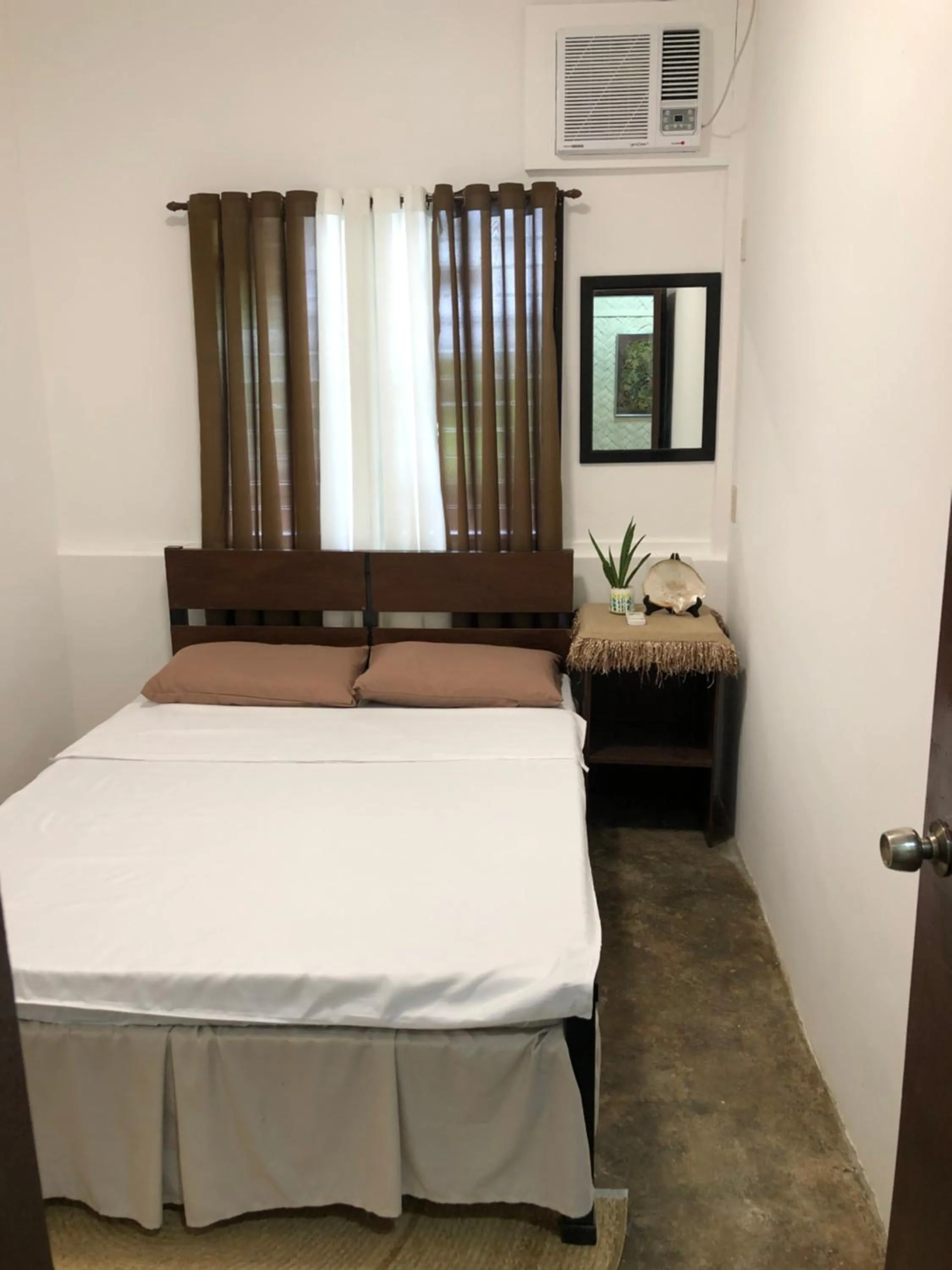 Bed in Hiraya Homestay Coron