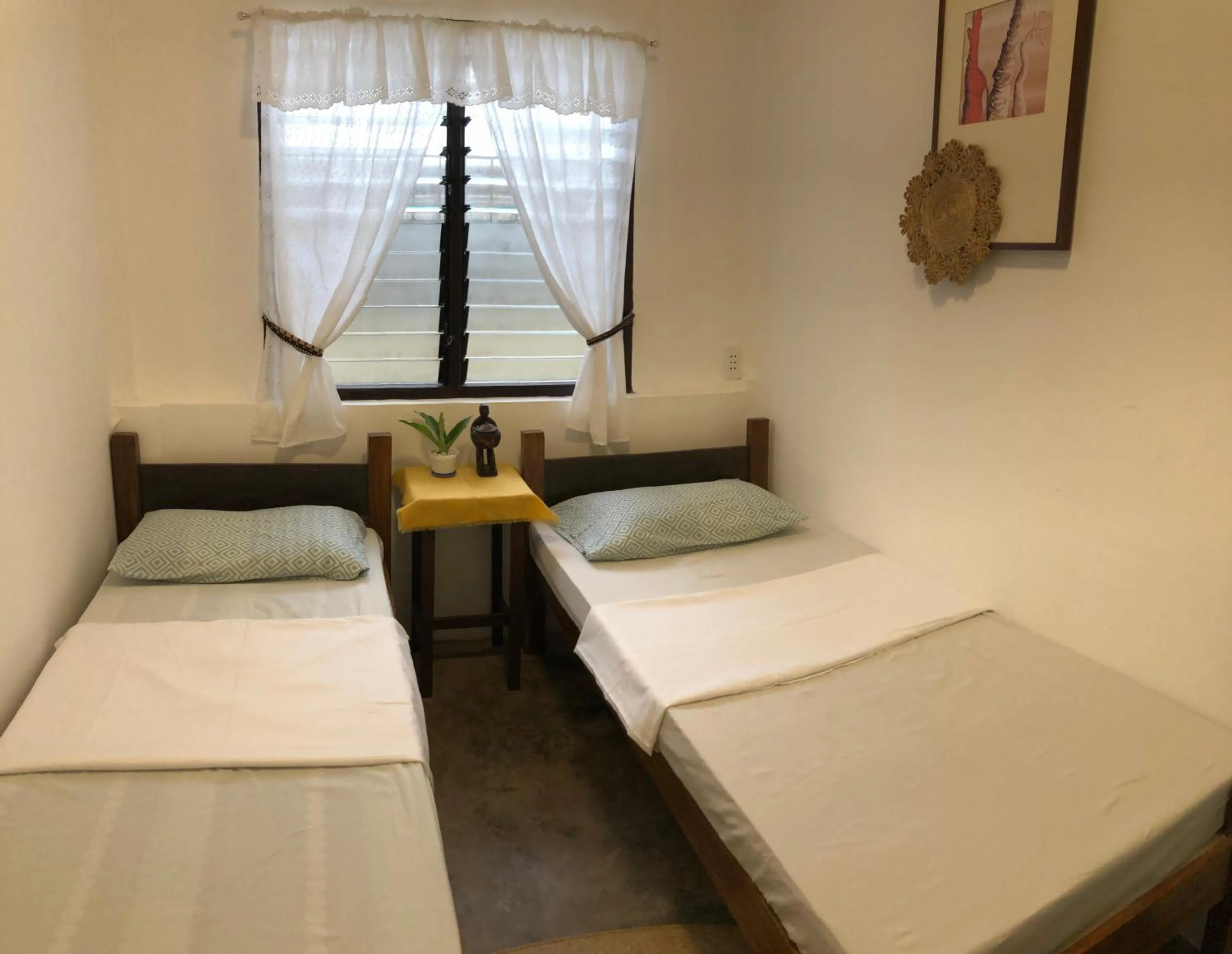 Bed in Hiraya Homestay Coron
