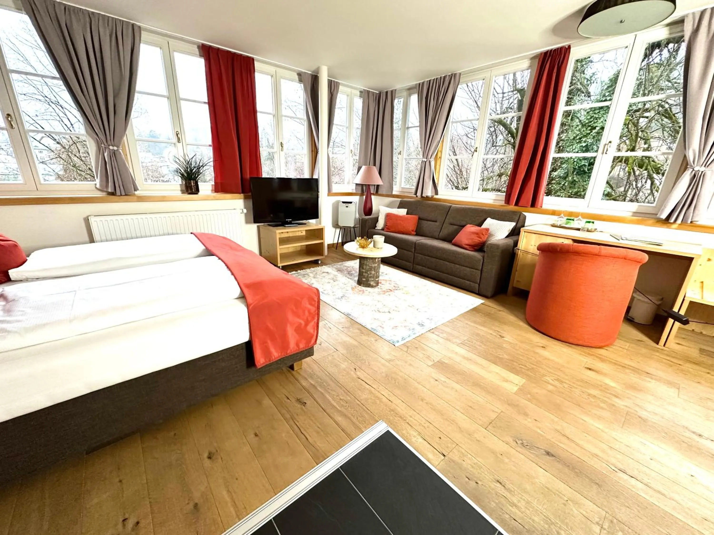 Seating area, Bed in Boutiquehotel Hubertushof